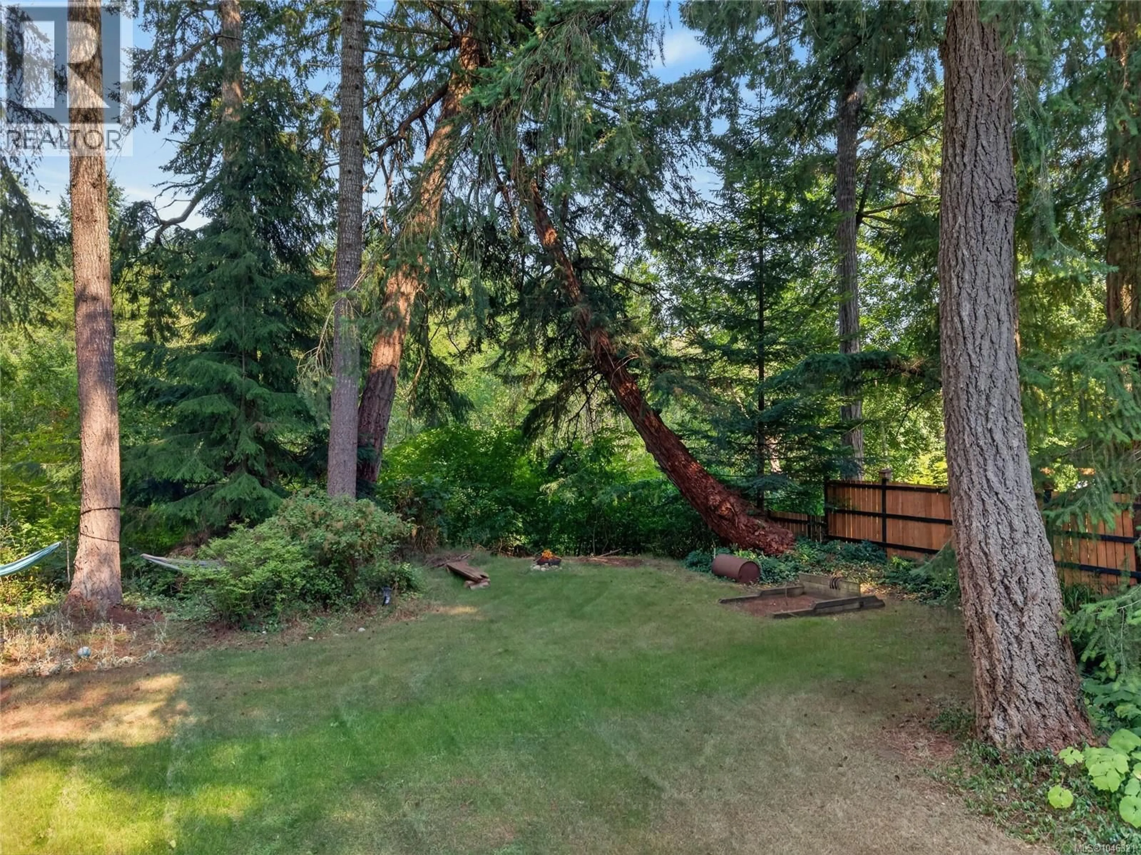 A pic from outside/outdoor area/front of a property/back of a property/a pic from drone, forest/trees view for 8830 CLARKSON AVENUE, Black Creek British Columbia V9J1A7