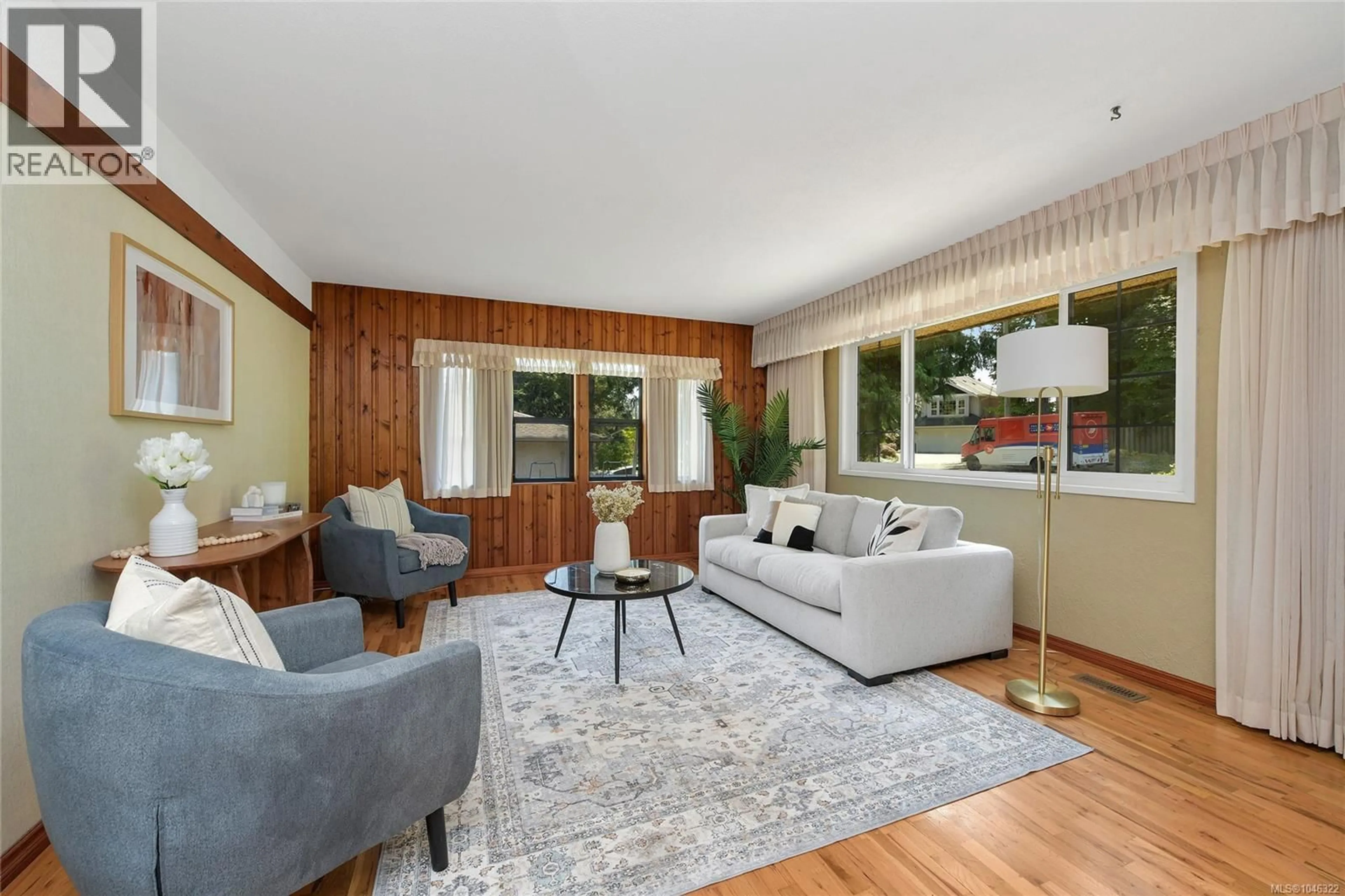 Living room with furniture, wood/laminate floor for 2970 GLEN LAKE ROAD, Langford British Columbia V9B4B1
