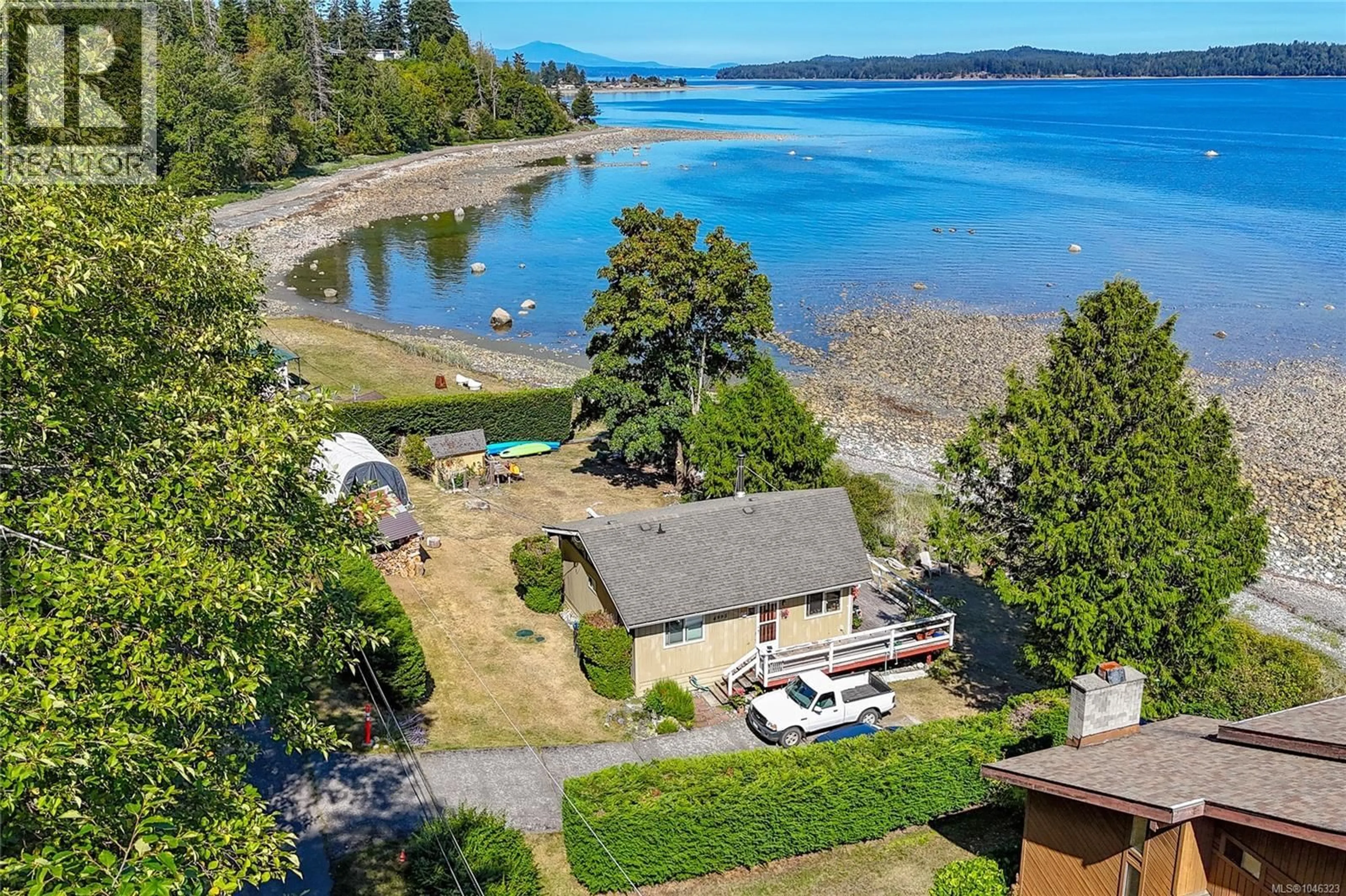 A pic from outside/outdoor area/front of a property/back of a property/a pic from drone, water/lake/river/ocean view for 4995 SHORELINE DRIVE, Bowser British Columbia V0R1G0