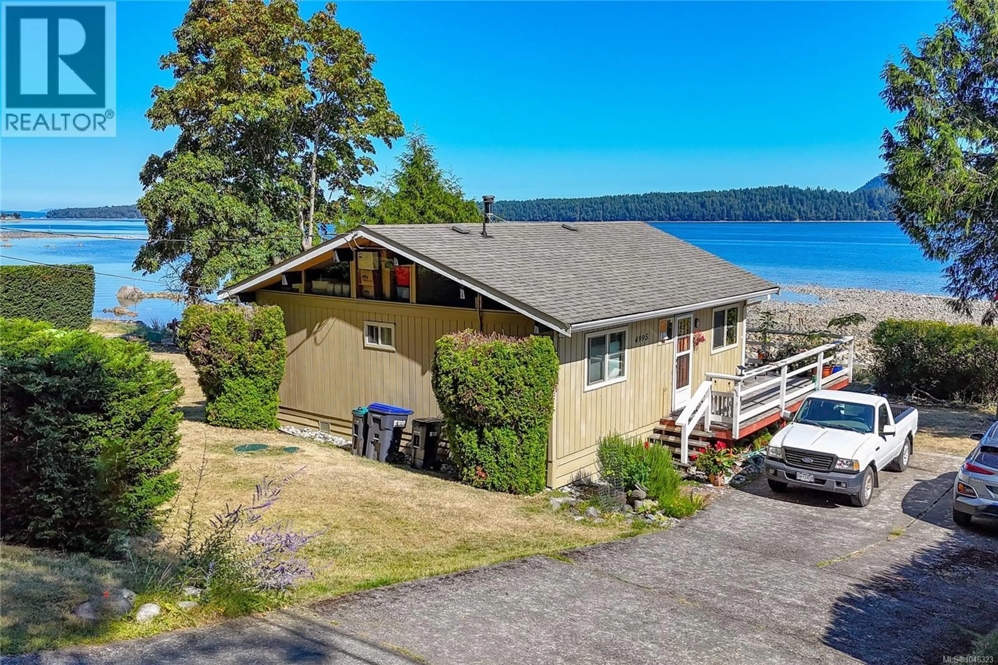A pic from outside/outdoor area/front of a property/back of a property/a pic from drone, water/lake/river/ocean view for 4995 SHORELINE DRIVE, Bowser British Columbia V0R1G0