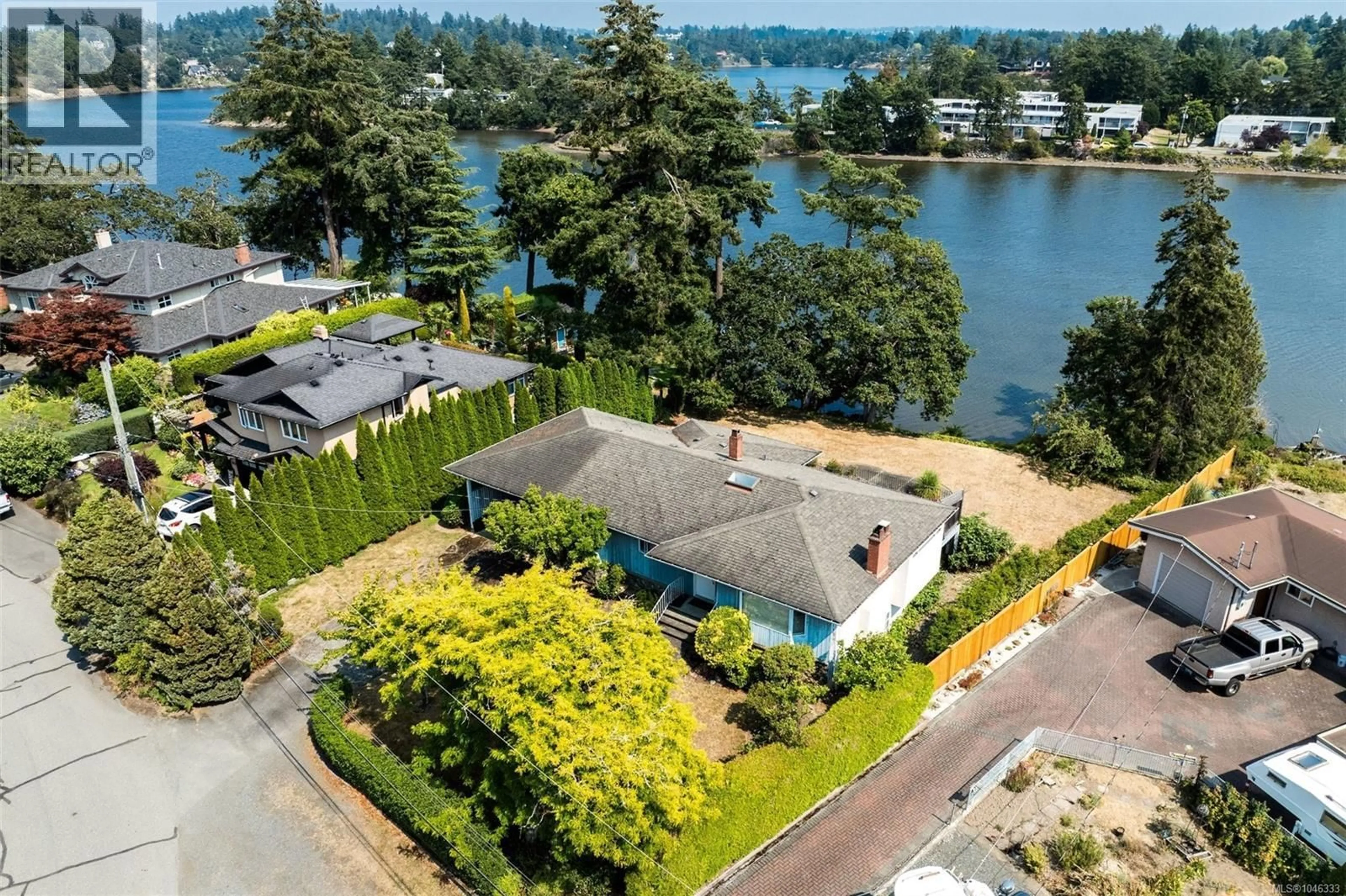 A pic from outside/outdoor area/front of a property/back of a property/a pic from drone, water/lake/river/ocean view for 107 KINGHAM PLACE, View Royal British Columbia V9B1L9