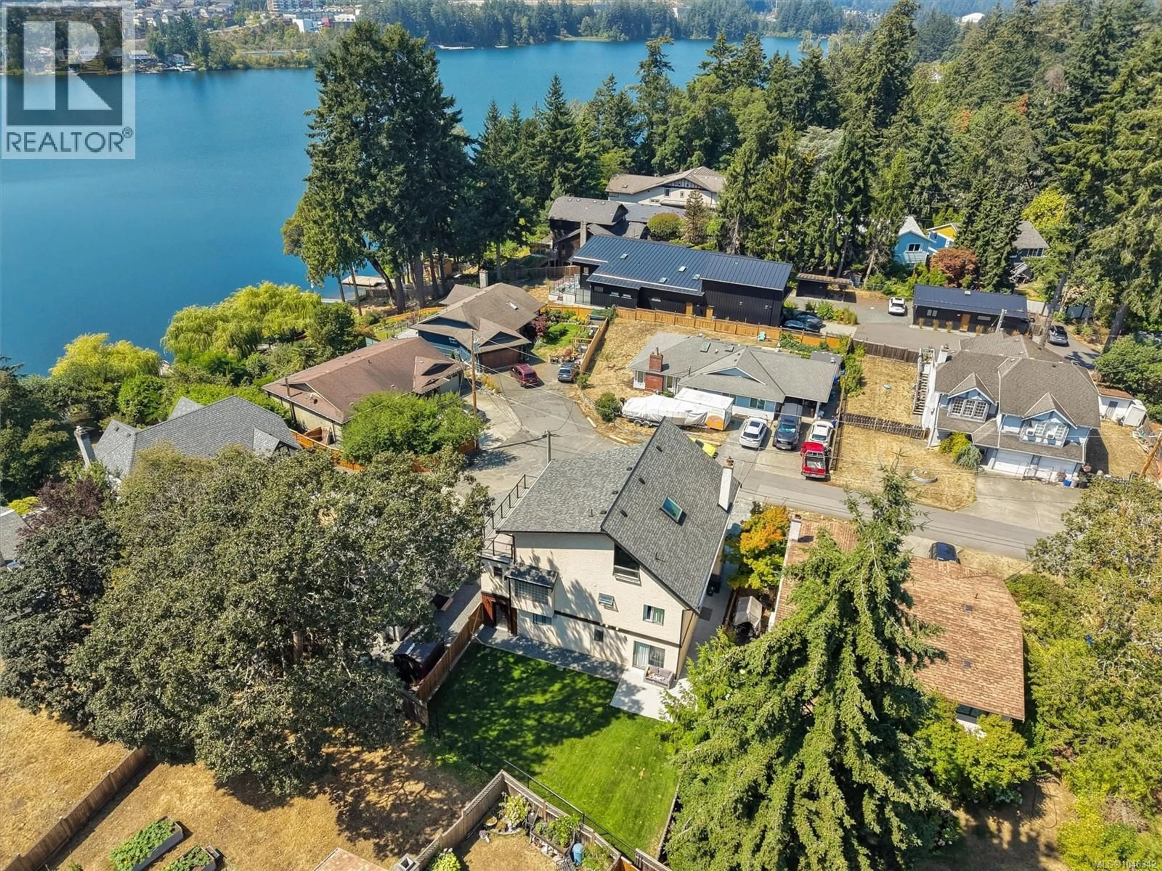 A pic from outside/outdoor area/front of a property/back of a property/a pic from drone, water/lake/river/ocean view for 1143 LINDSAY PLACE, Langford British Columbia V9B5N9