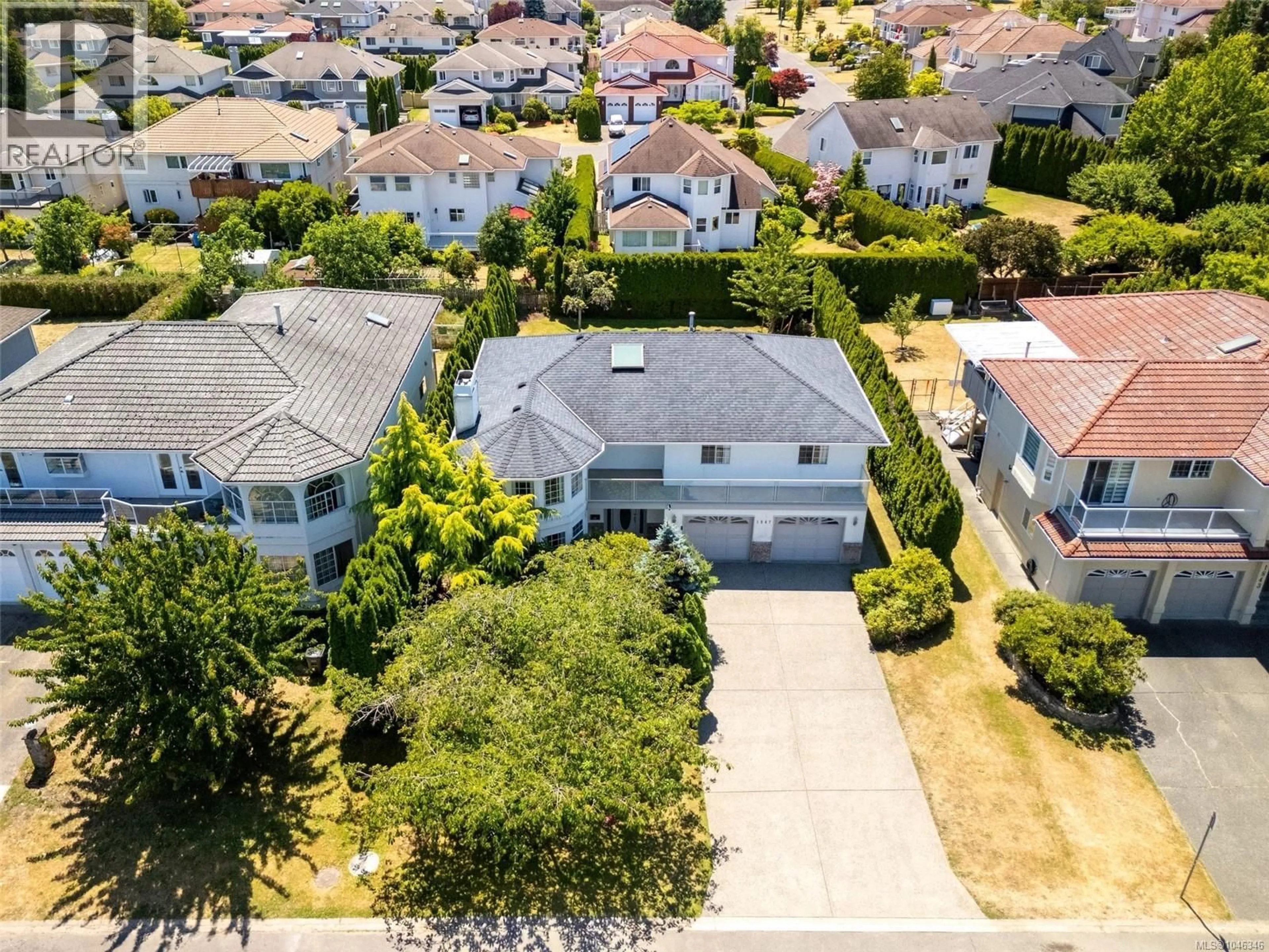A pic from outside/outdoor area/front of a property/back of a property/a pic from drone, street for 1847 EL SERENO DRIVE, Saanich British Columbia V8N6K4