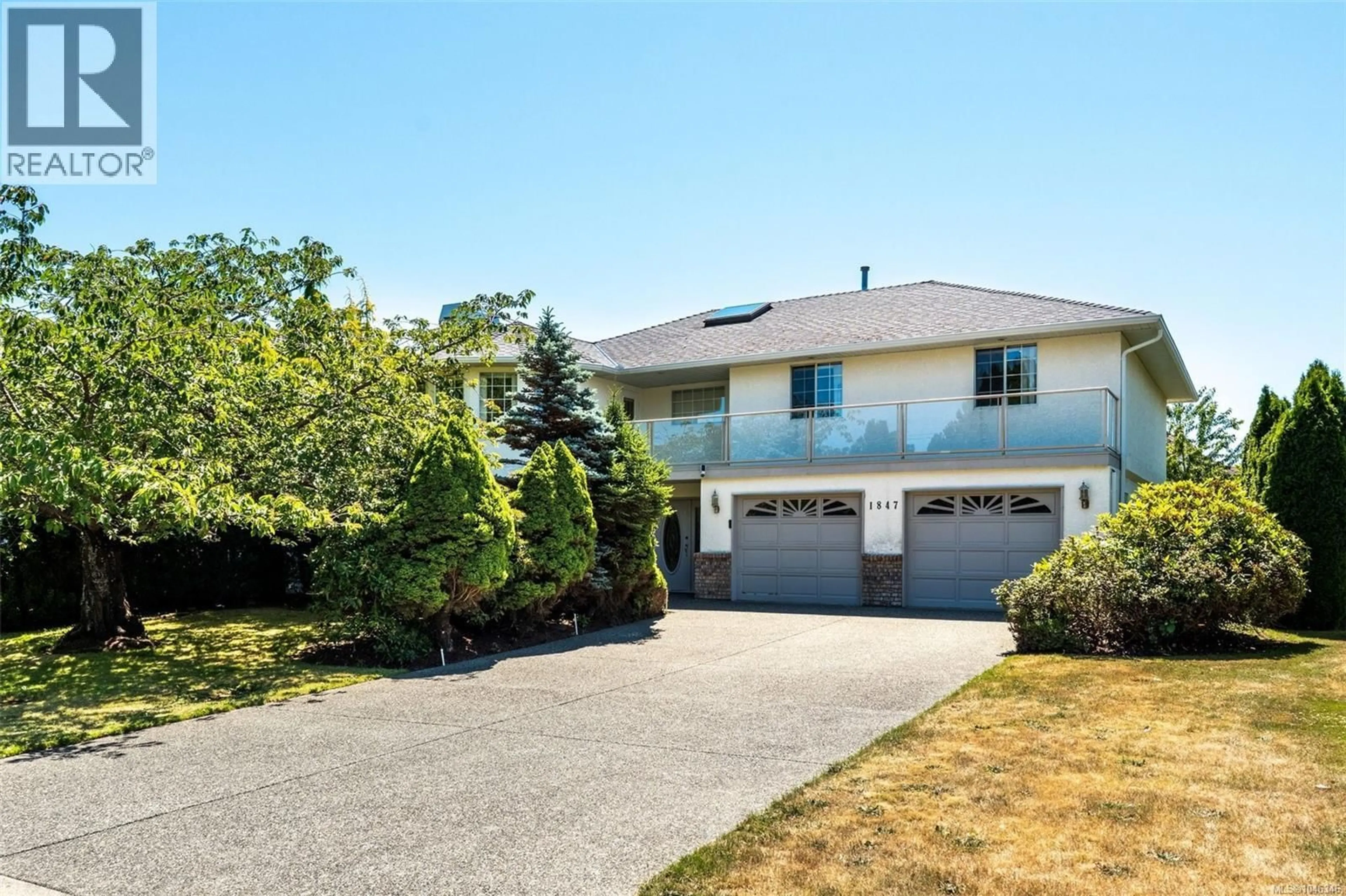 A pic from outside/outdoor area/front of a property/back of a property/a pic from drone, street for 1847 EL SERENO DRIVE, Saanich British Columbia V8N6K4