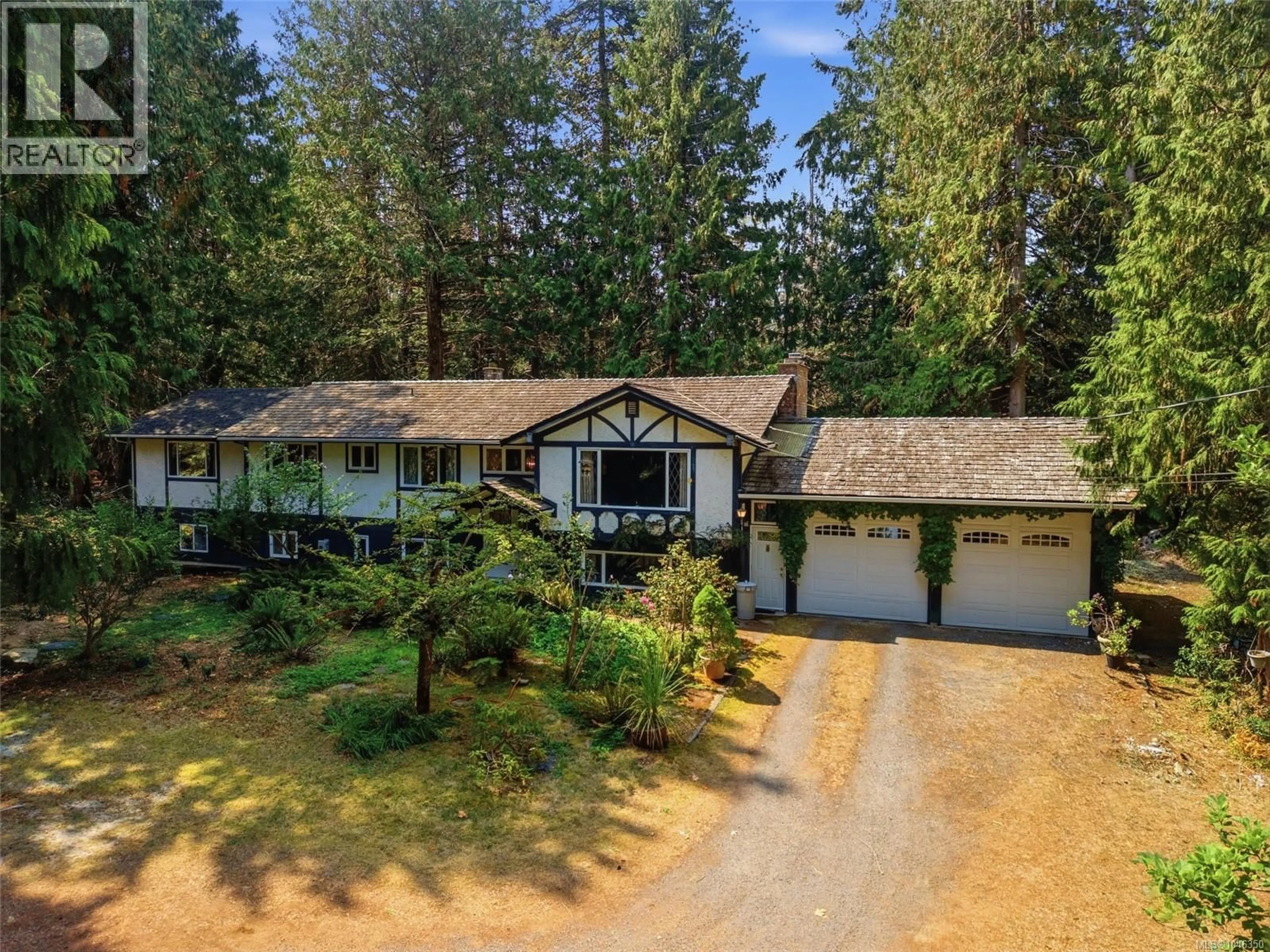 A pic from outside/outdoor area/front of a property/back of a property/a pic from drone, unknown for 850 VILLAGE WAY, Qualicum Beach British Columbia V9K1K8