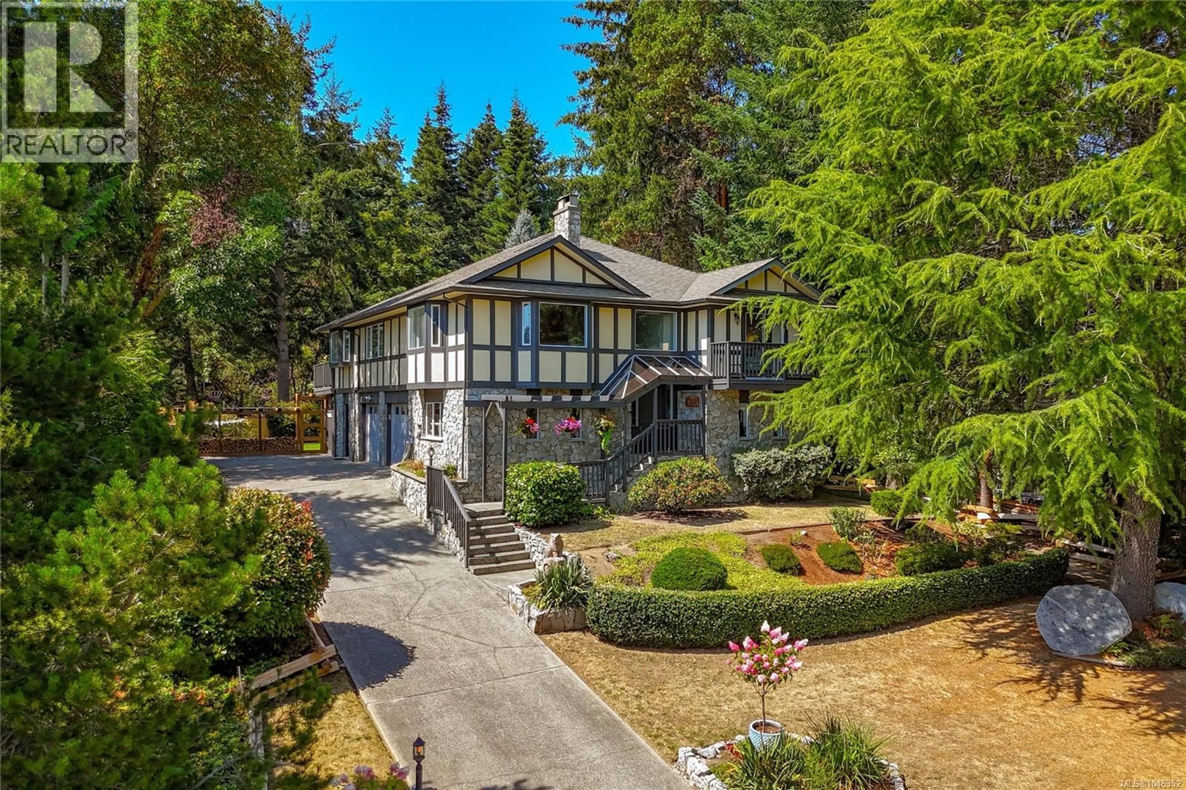 A pic from outside/outdoor area/front of a property/back of a property/a pic from drone, street for 1866 BARRETT DRIVE, North Saanich British Columbia V8L4V2
