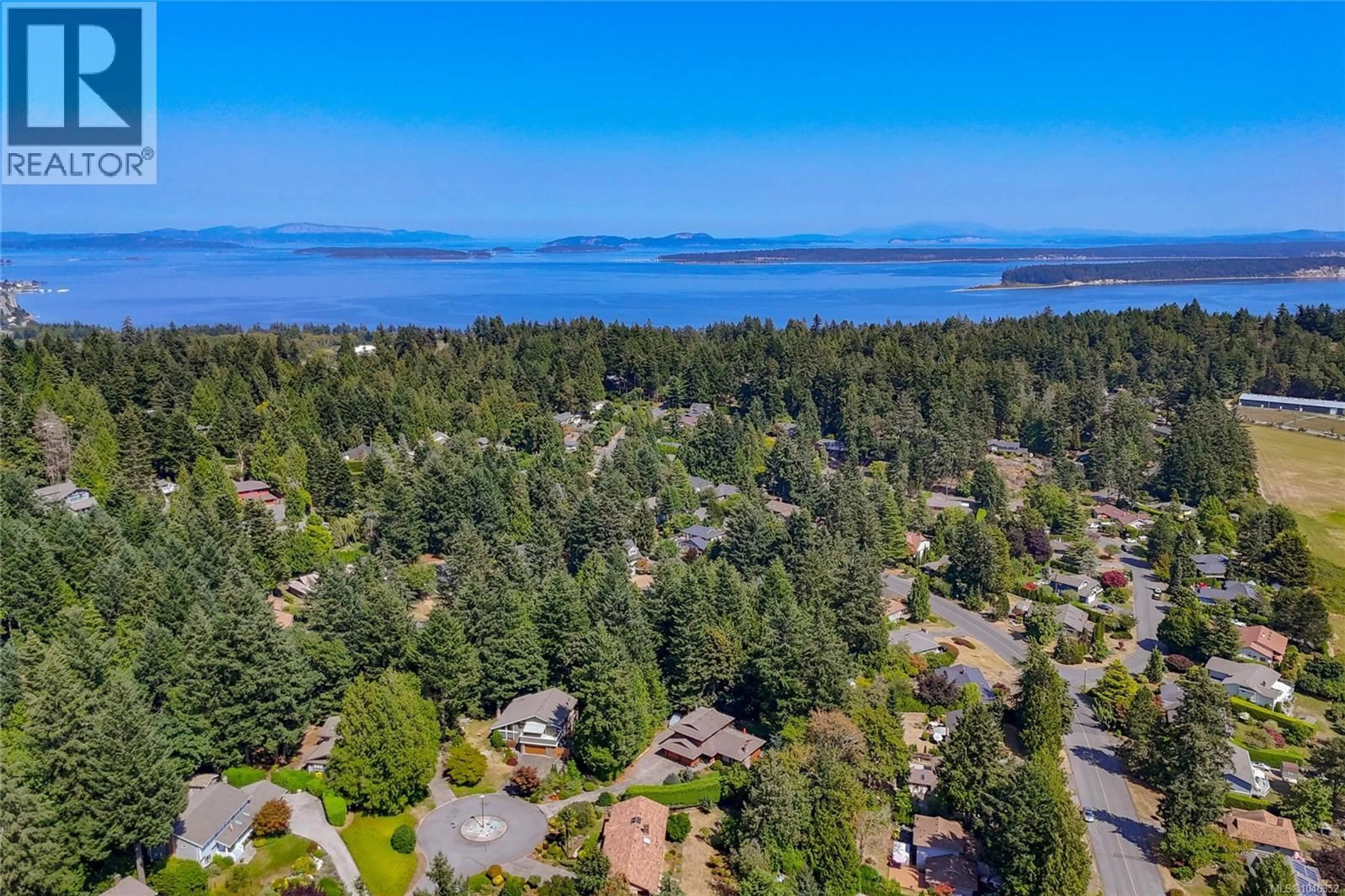 A pic from outside/outdoor area/front of a property/back of a property/a pic from drone, water/lake/river/ocean view for 1866 BARRETT DRIVE, North Saanich British Columbia V8L4V2