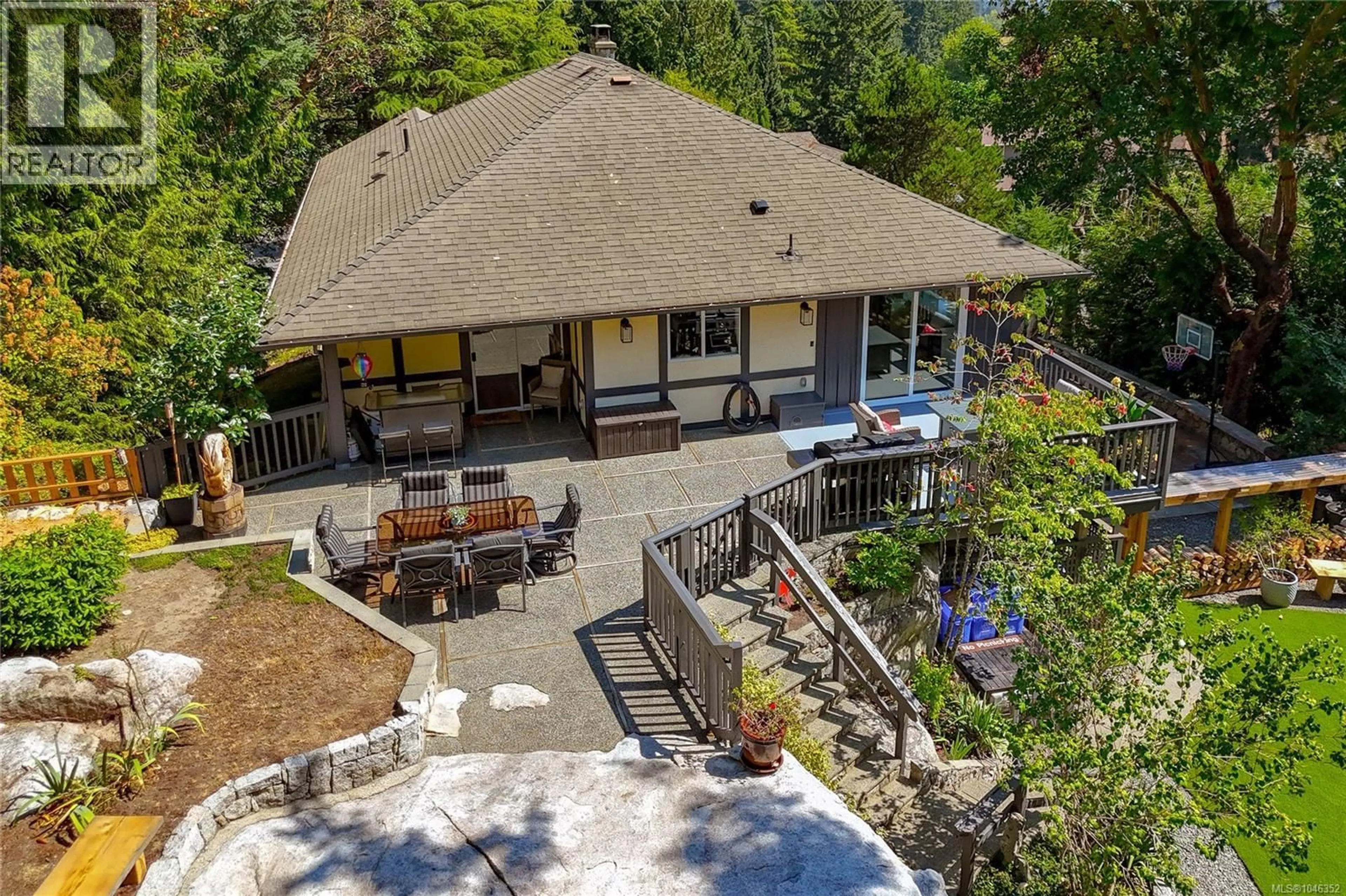A pic from outside/outdoor area/front of a property/back of a property/a pic from drone, mountain view for 1866 BARRETT DRIVE, North Saanich British Columbia V8L4V2