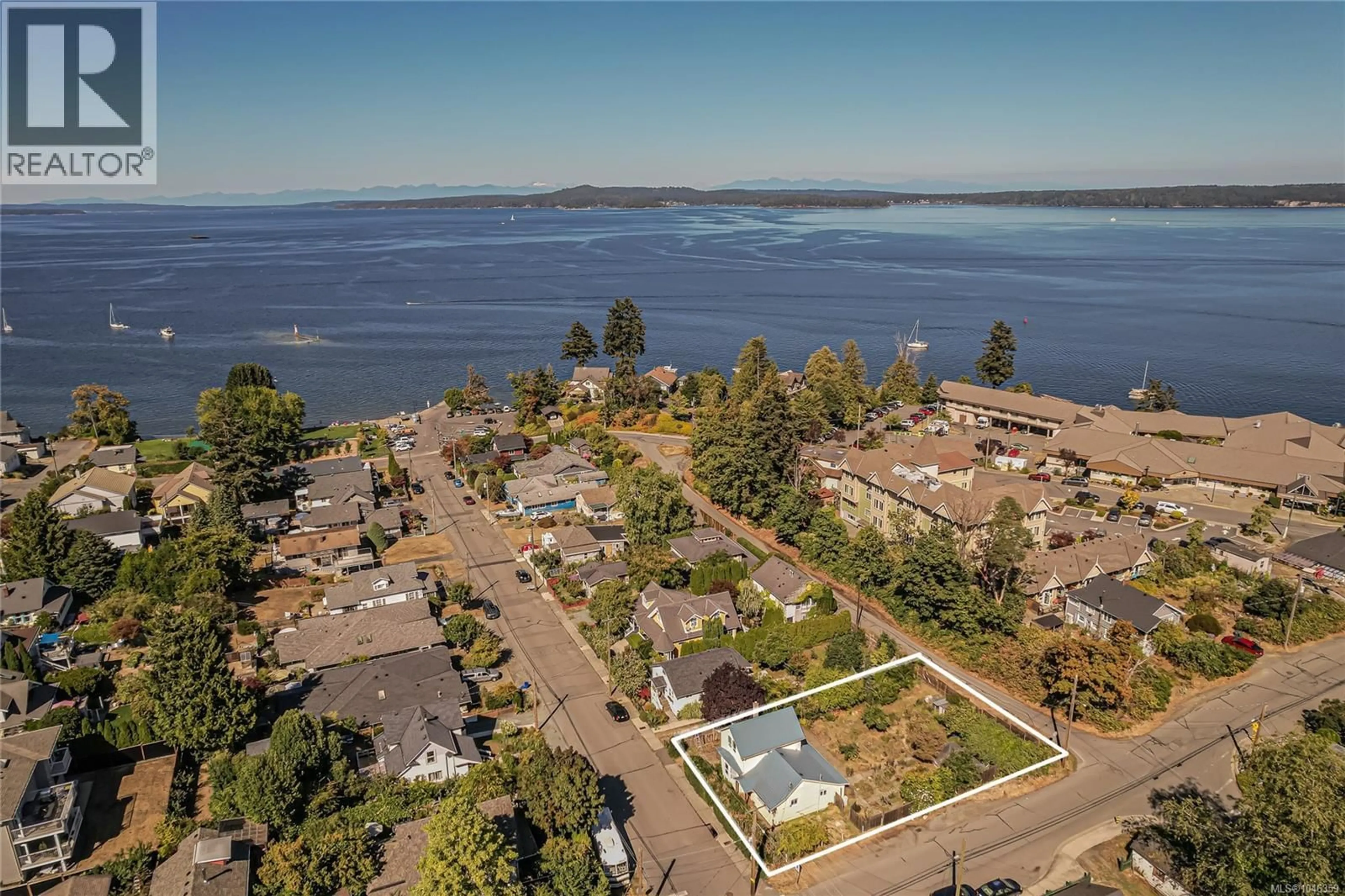 A pic from outside/outdoor area/front of a property/back of a property/a pic from drone, water/lake/river/ocean view for 9899 MAPLE STREET, Chemainus British Columbia V0R1K0