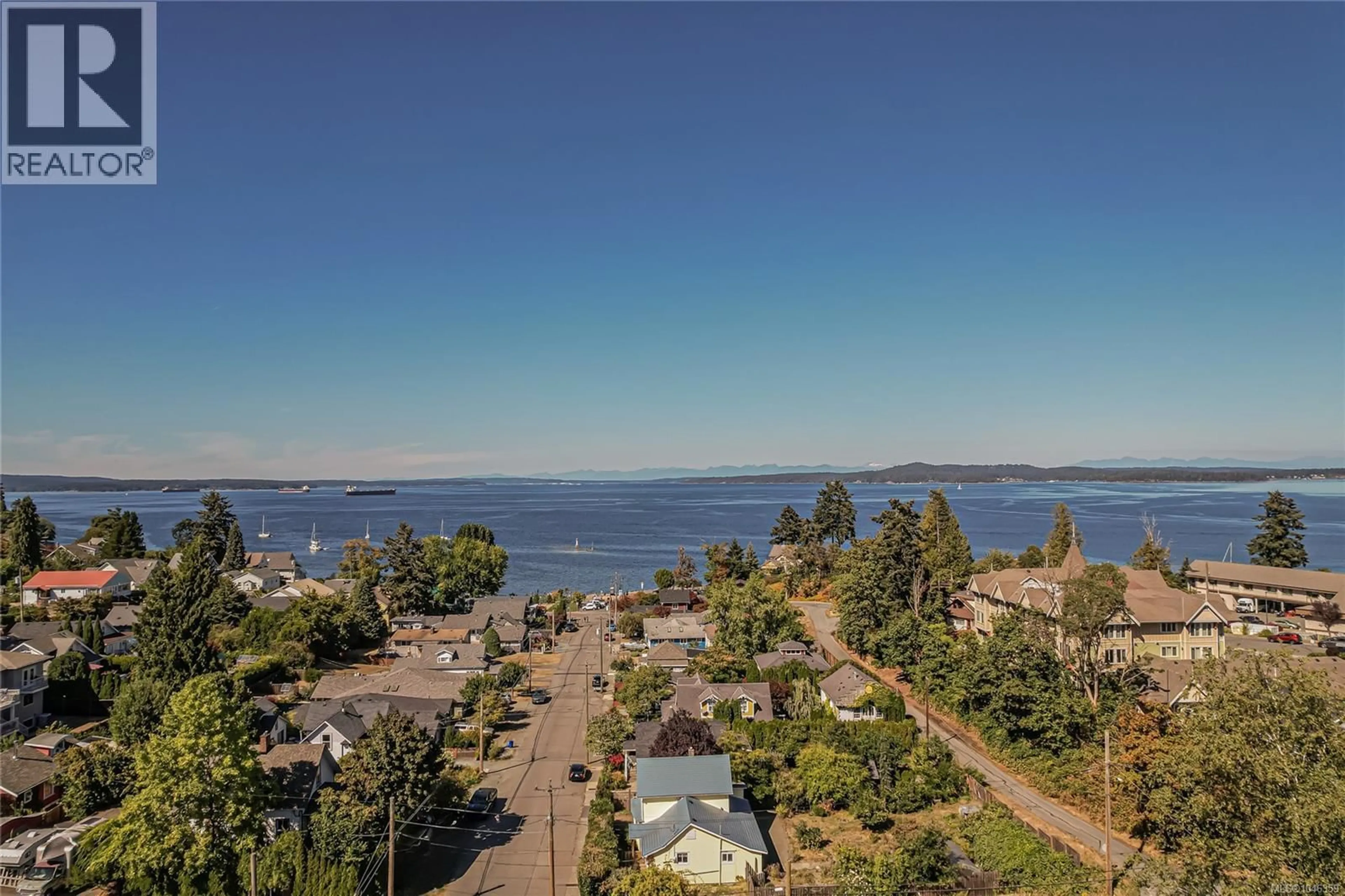 A pic from outside/outdoor area/front of a property/back of a property/a pic from drone, water/lake/river/ocean view for 9899 MAPLE STREET, Chemainus British Columbia V0R1K0