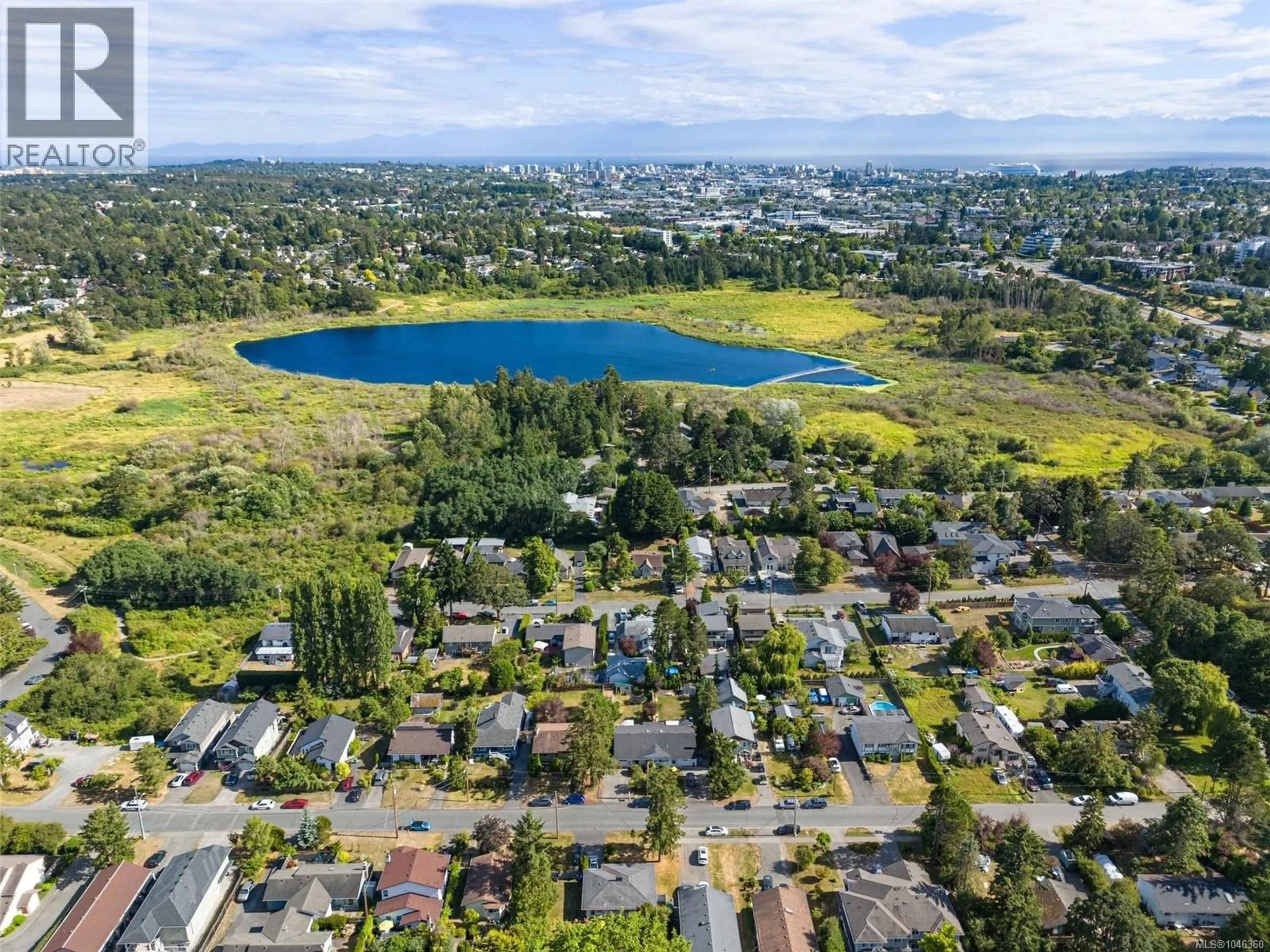 A pic from outside/outdoor area/front of a property/back of a property/a pic from drone, water/lake/river/ocean view for 855 SEVENOAKS ROAD, Saanich British Columbia V8X3V8