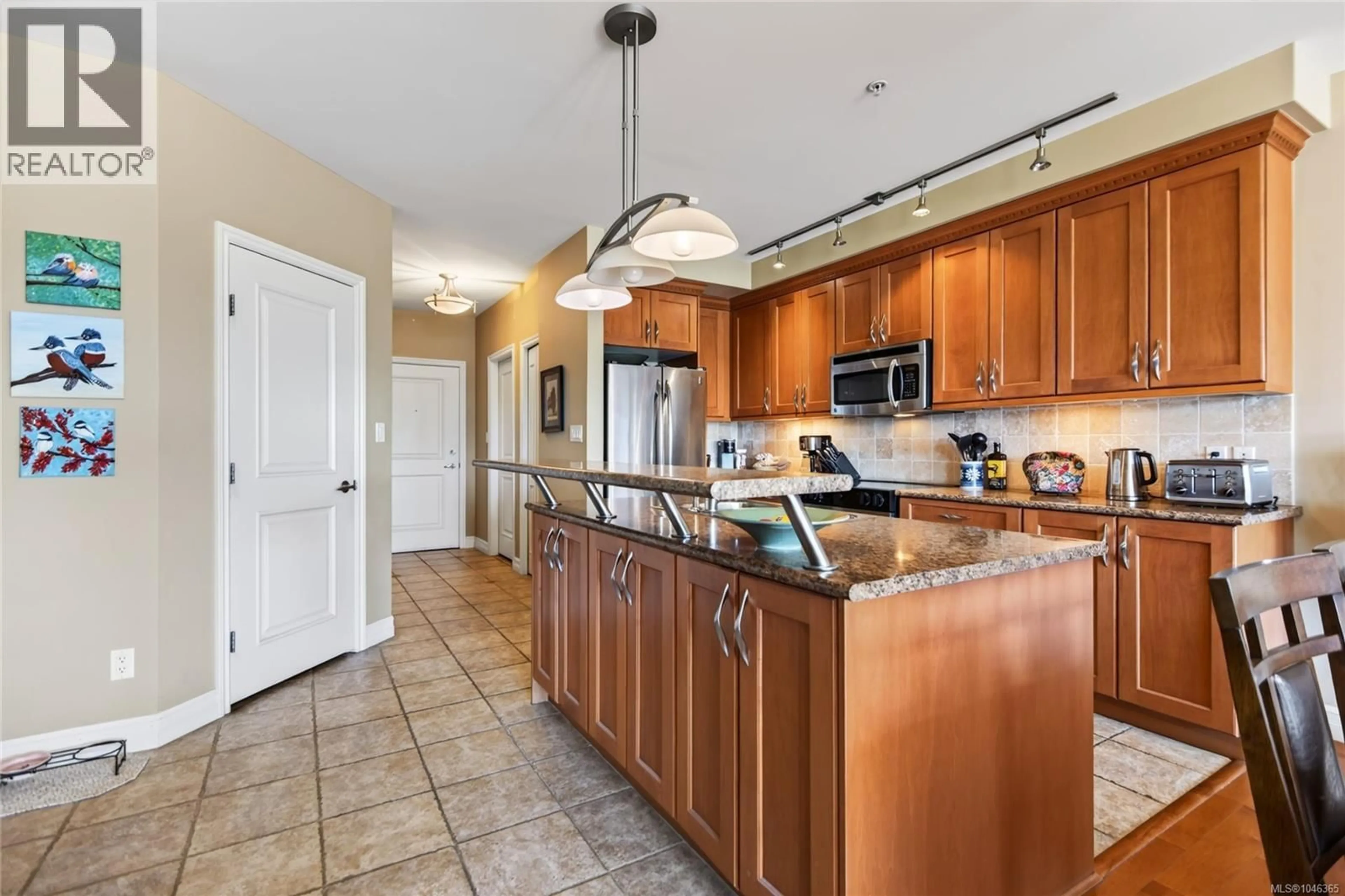 Open concept kitchen, ceramic/tile floor for 436 - 2300 MANSFIELD DRIVE, Courtenay British Columbia V9N3S3