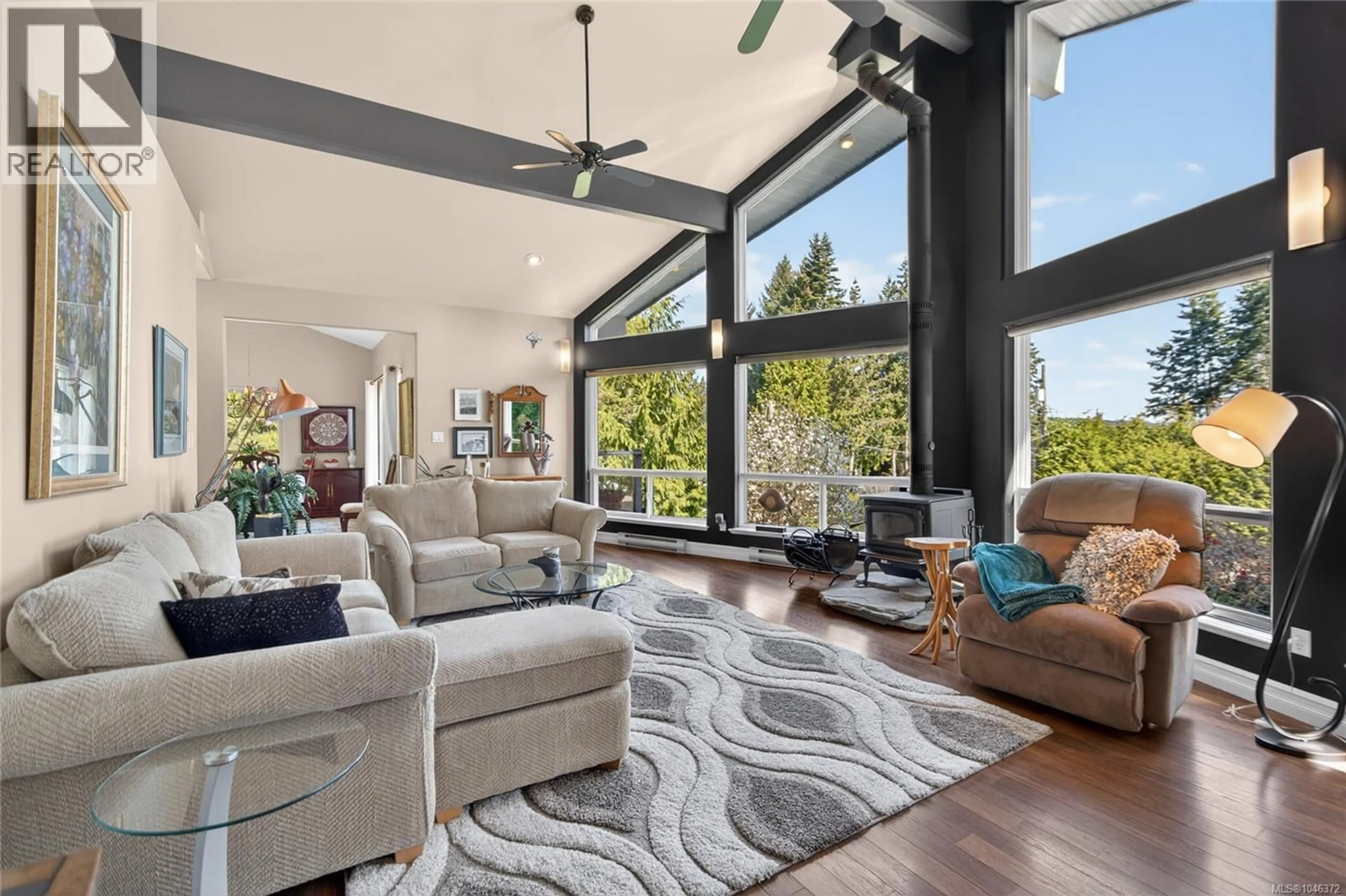 Living room with furniture, unknown for 4594 MAPLE GUARD DRIVE, Bowser British Columbia V0R1G0