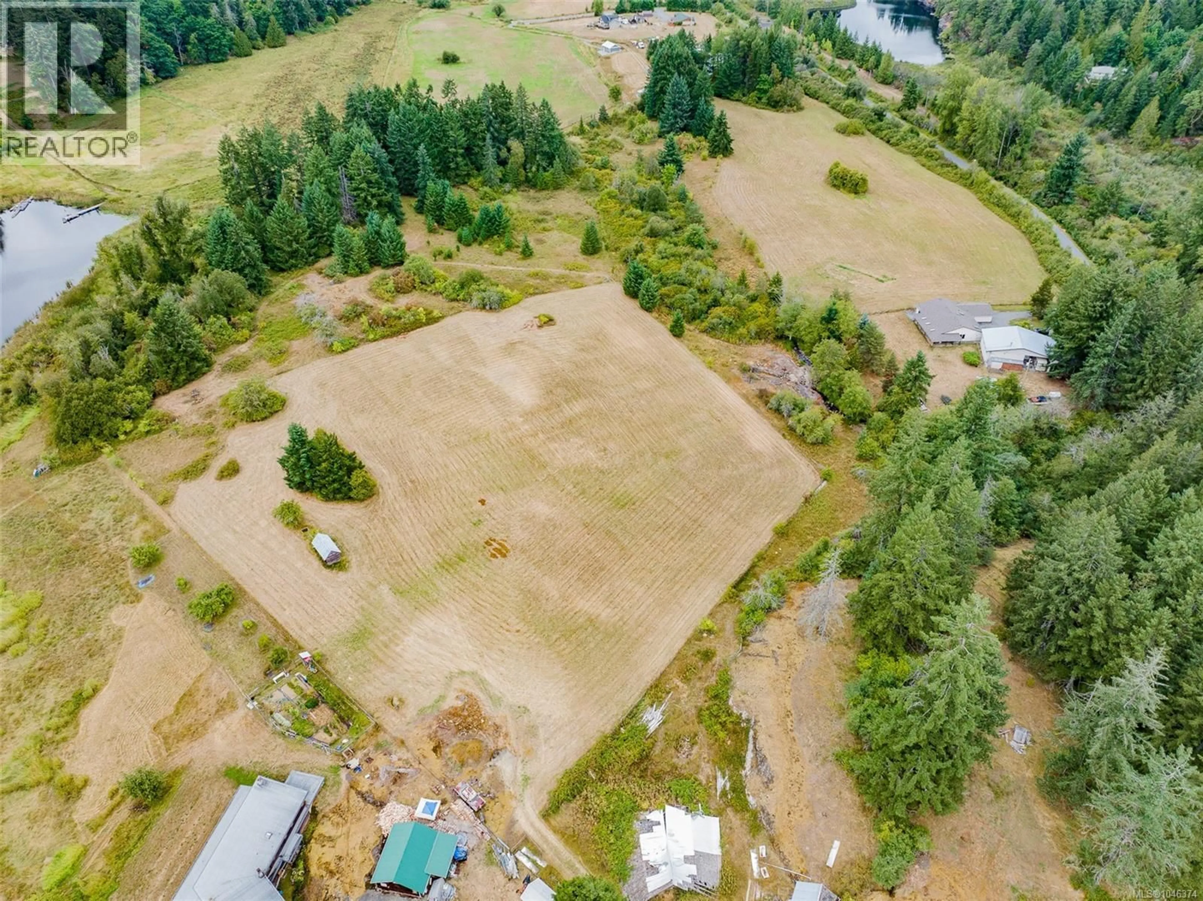 A pic from outside/outdoor area/front of a property/back of a property/a pic from drone, forest/trees view for 2445 GODFREY ROAD, Nanaimo British Columbia V9X1E6