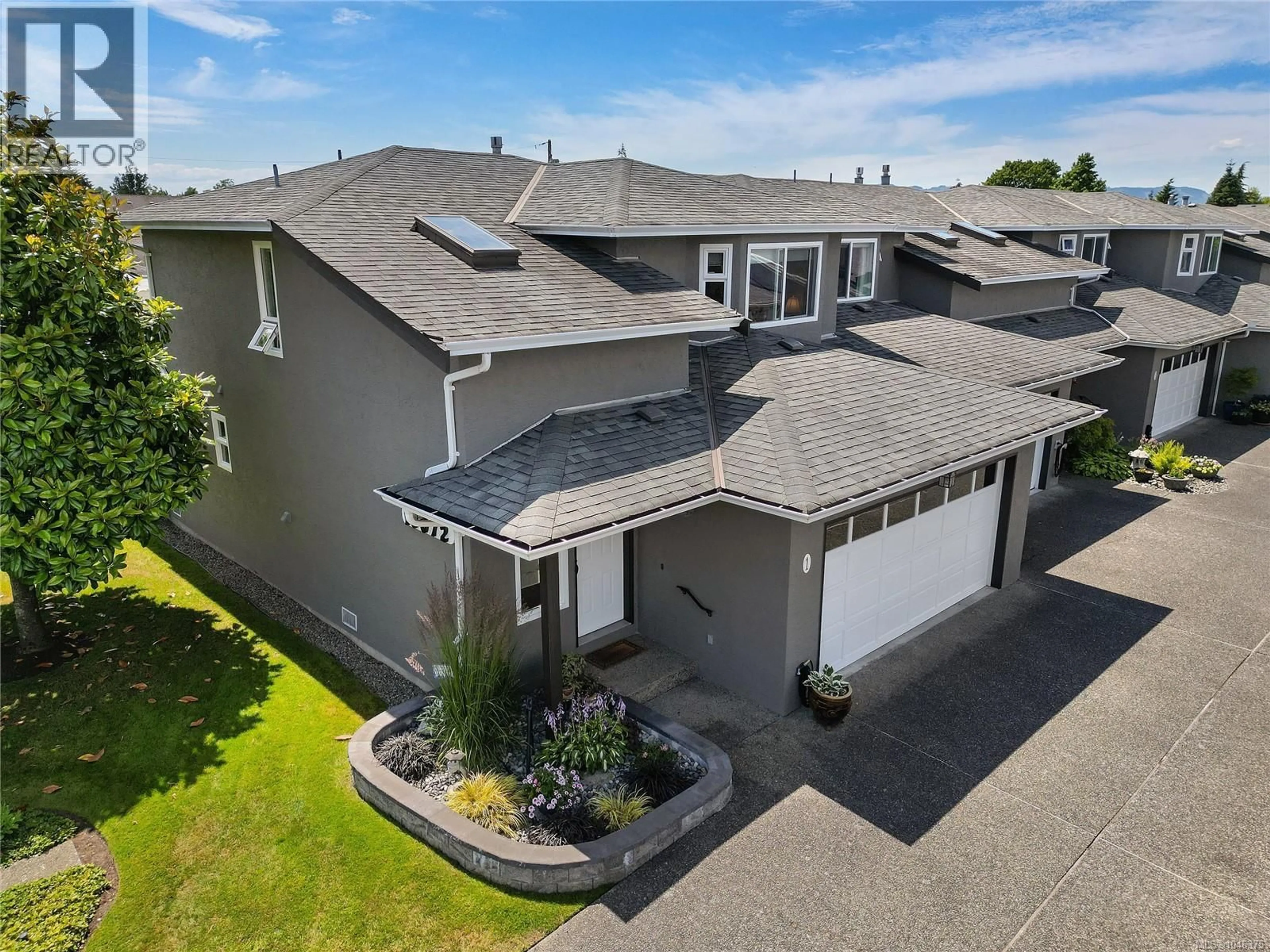 A pic from outside/outdoor area/front of a property/back of a property/a pic from drone, street for 1 - 10072 THIRD STREET, Sidney British Columbia V8L3B3