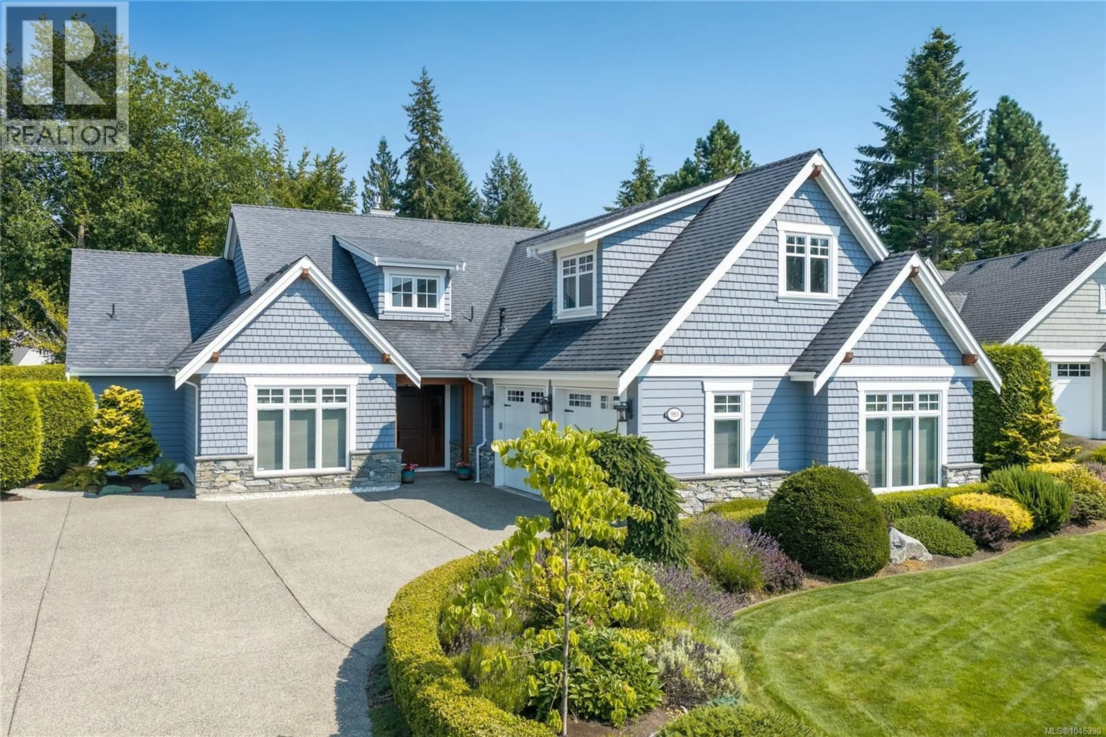 Home with vinyl exterior material, street for 983 BLUFFS DRIVE, Qualicum Beach British Columbia V9K0A2