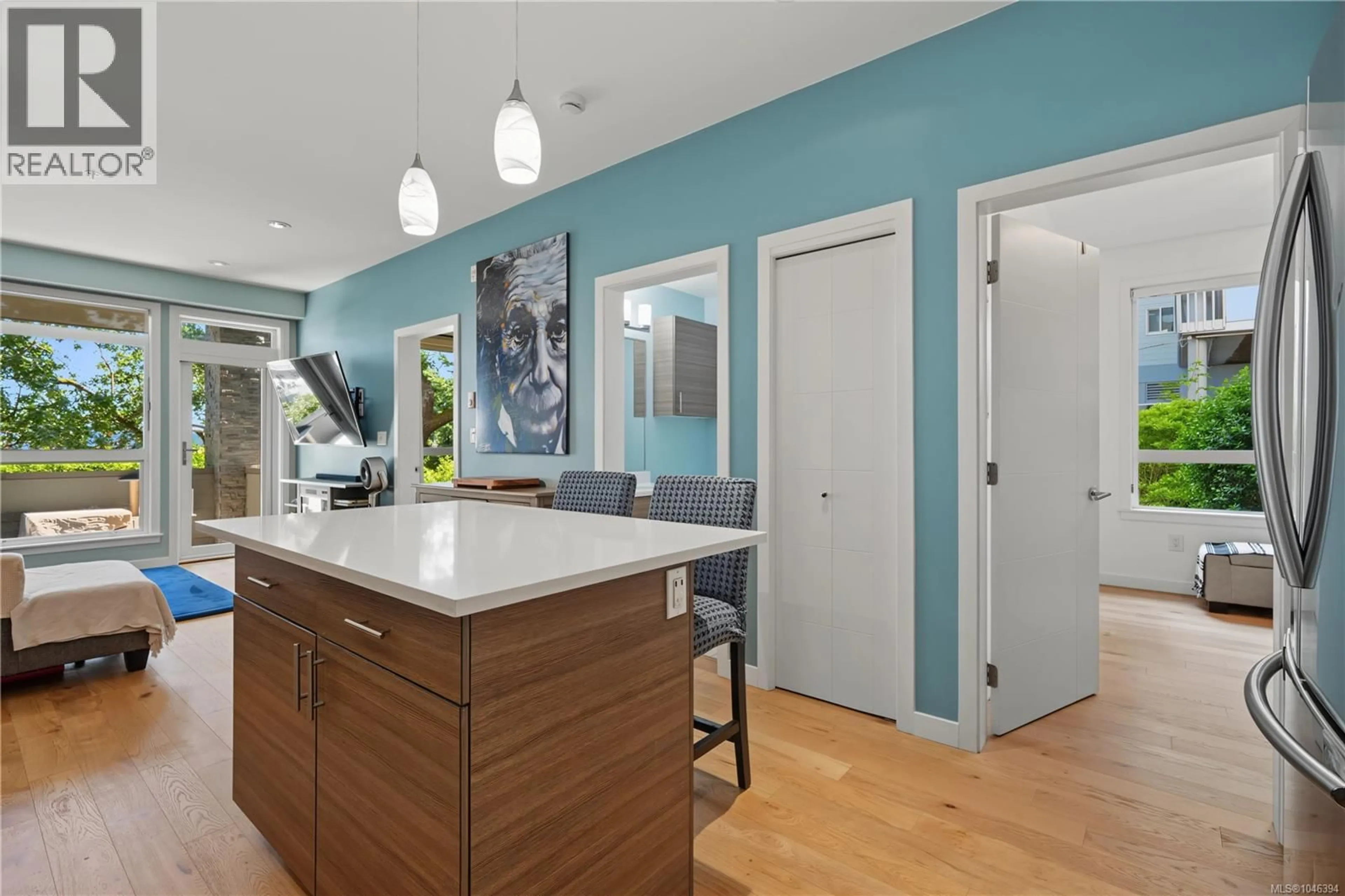 Open concept kitchen, wood/laminate floor for 109 - 924 ESQUIMALT ROAD, Esquimalt British Columbia V9A3P2