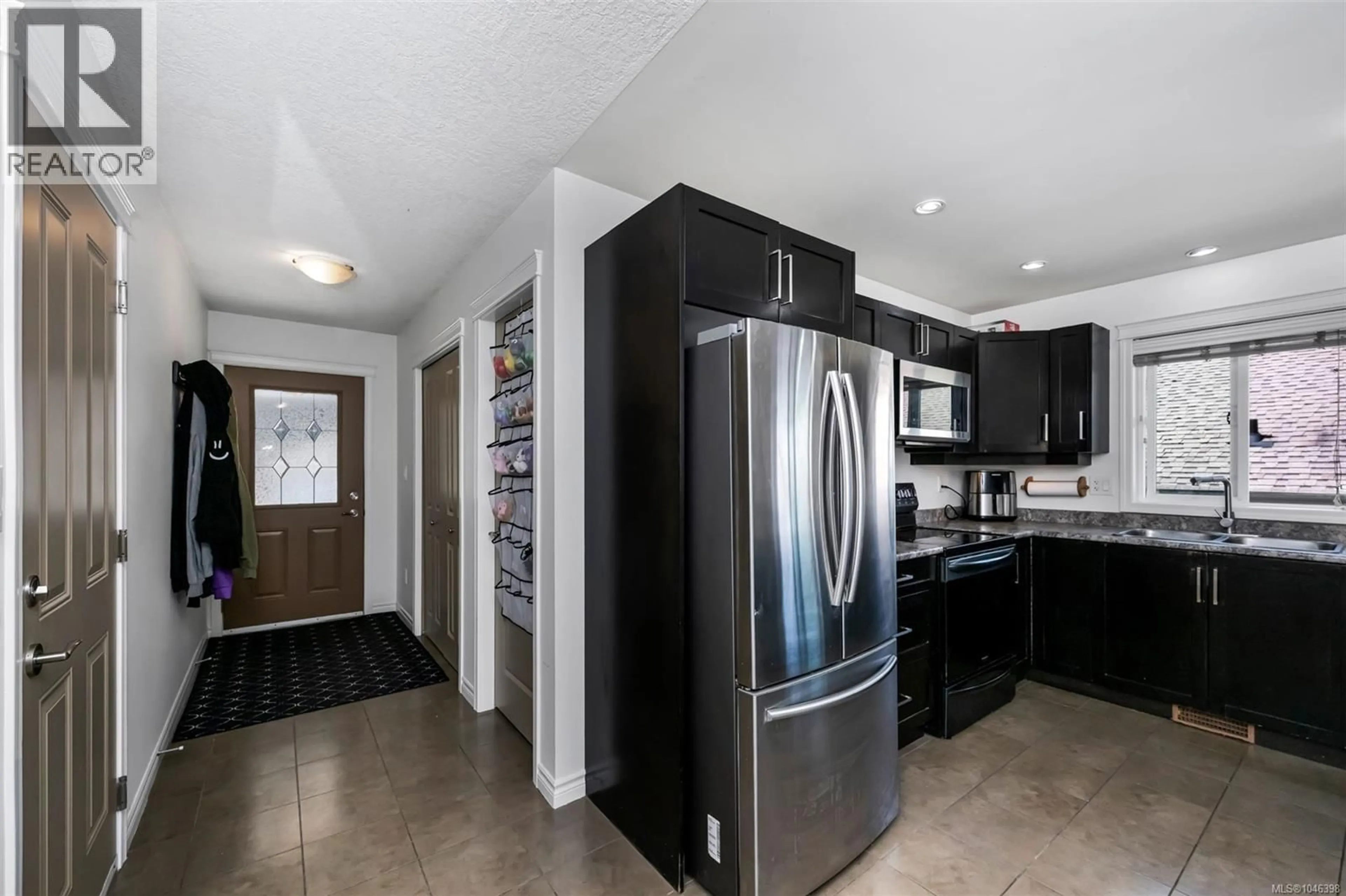 Open concept kitchen, ceramic/tile floor for 1065 FITZGERALD ROAD, Shawnigan Lake British Columbia V0R2W3