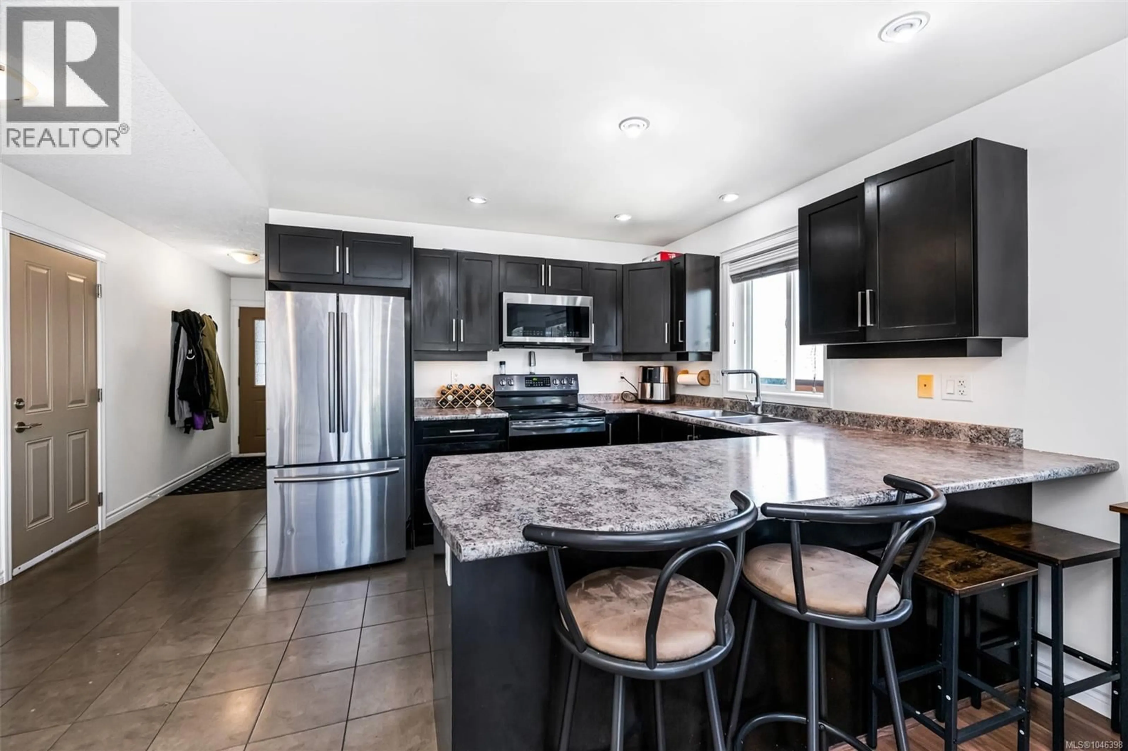 Open concept kitchen, ceramic/tile floor for 1065 FITZGERALD ROAD, Shawnigan Lake British Columbia V0R2W3