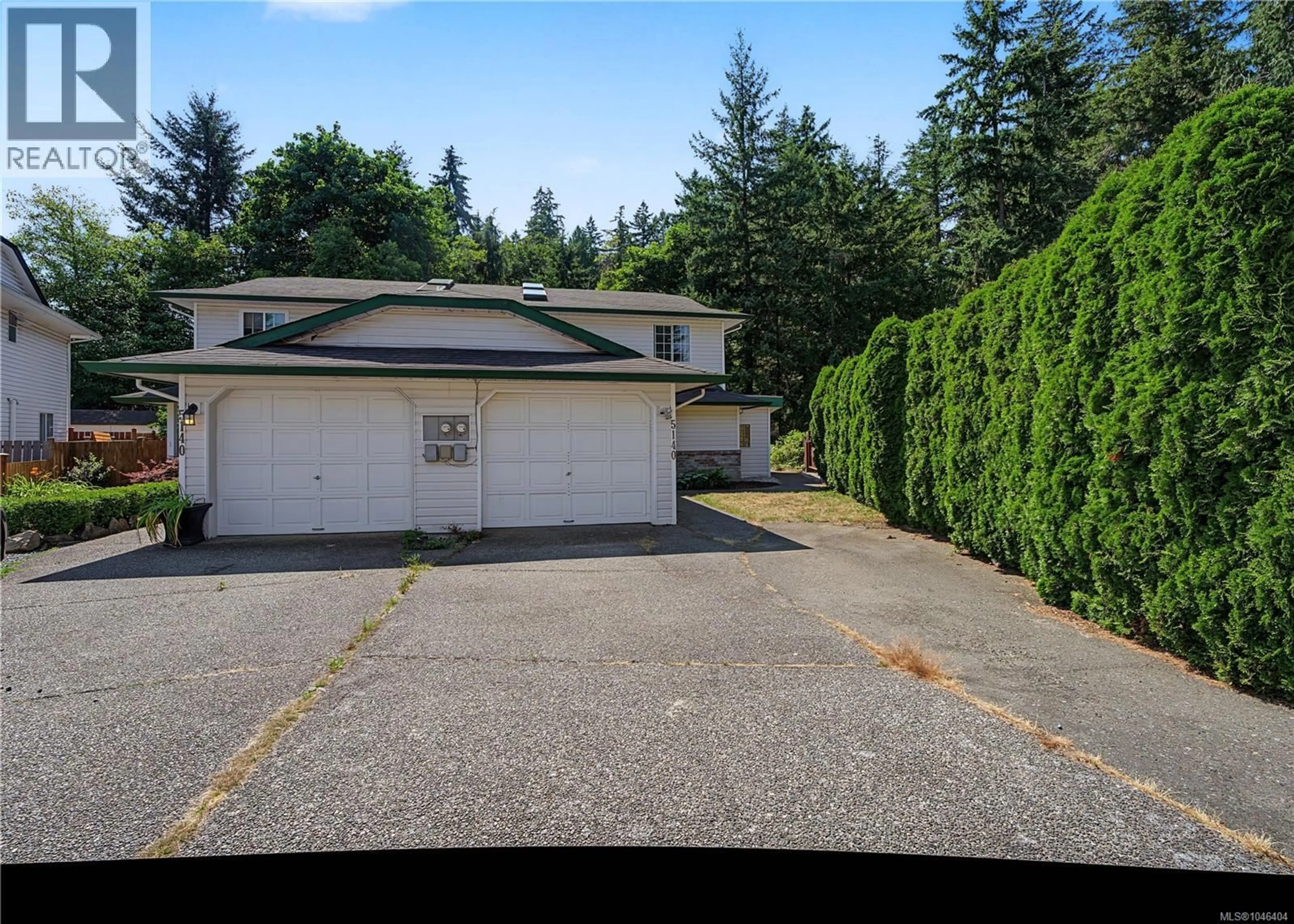 A pic from outside/outdoor area/front of a property/back of a property/a pic from drone, street for 2 - 5140 CAROL PLACE, Nanaimo British Columbia V9T5Z3