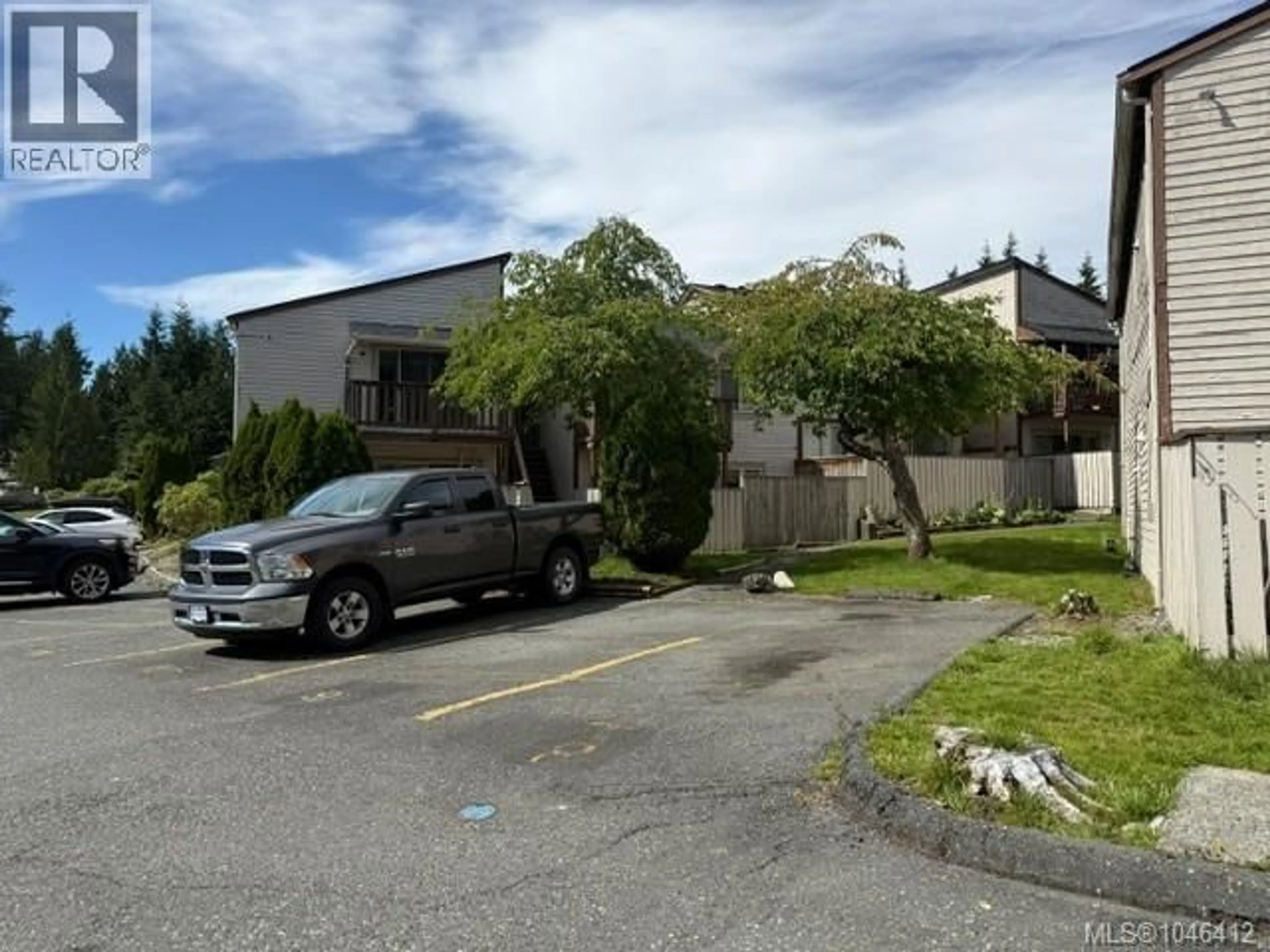 A pic from outside/outdoor area/front of a property/back of a property/a pic from drone, street for 11 - 7077 HIGHLAND DRIVE, Port Hardy British Columbia V0N2P0