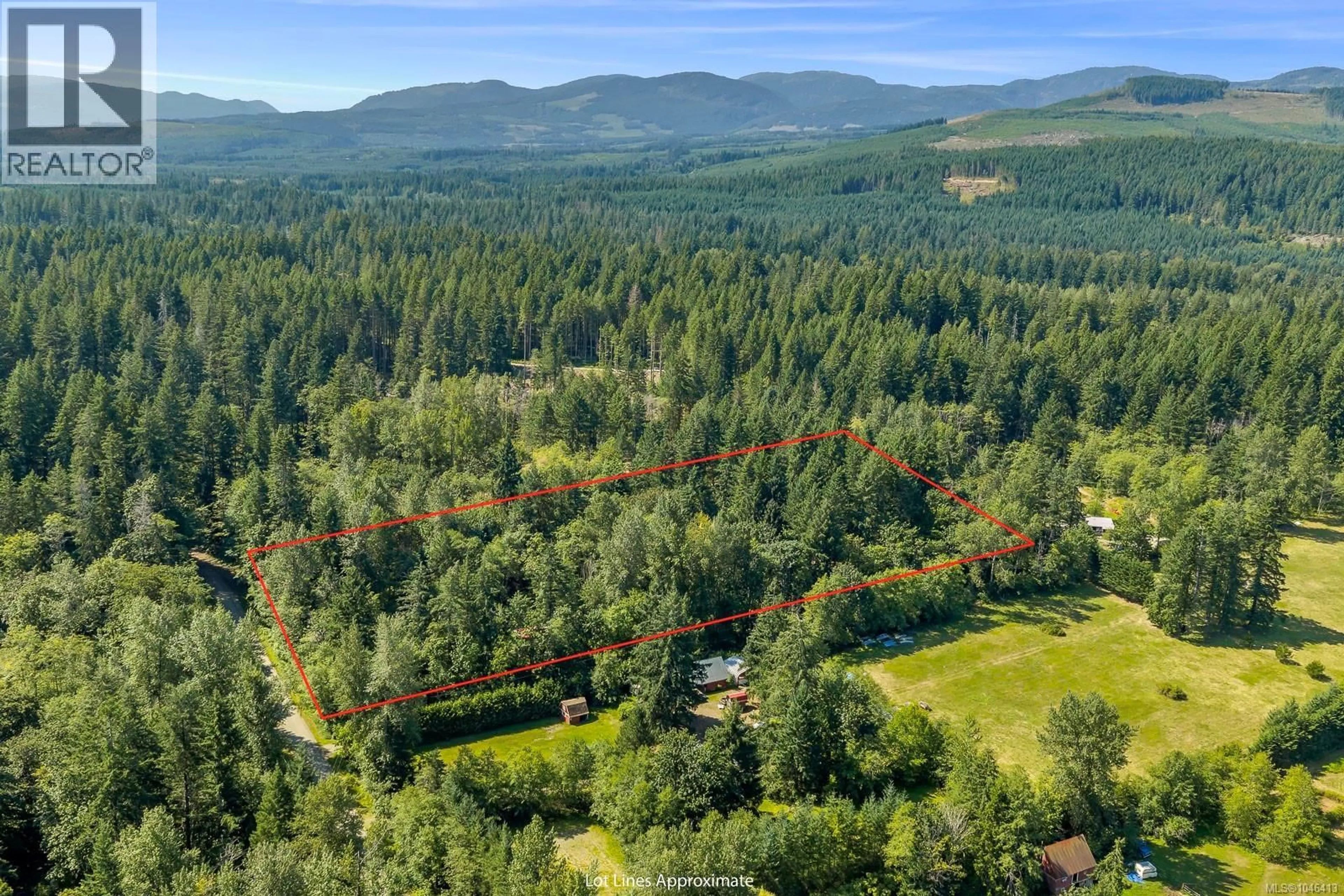 A pic from outside/outdoor area/front of a property/back of a property/a pic from drone, forest/trees view for 6425 FITZGERALD ROAD, Merville British Columbia V9J1N7