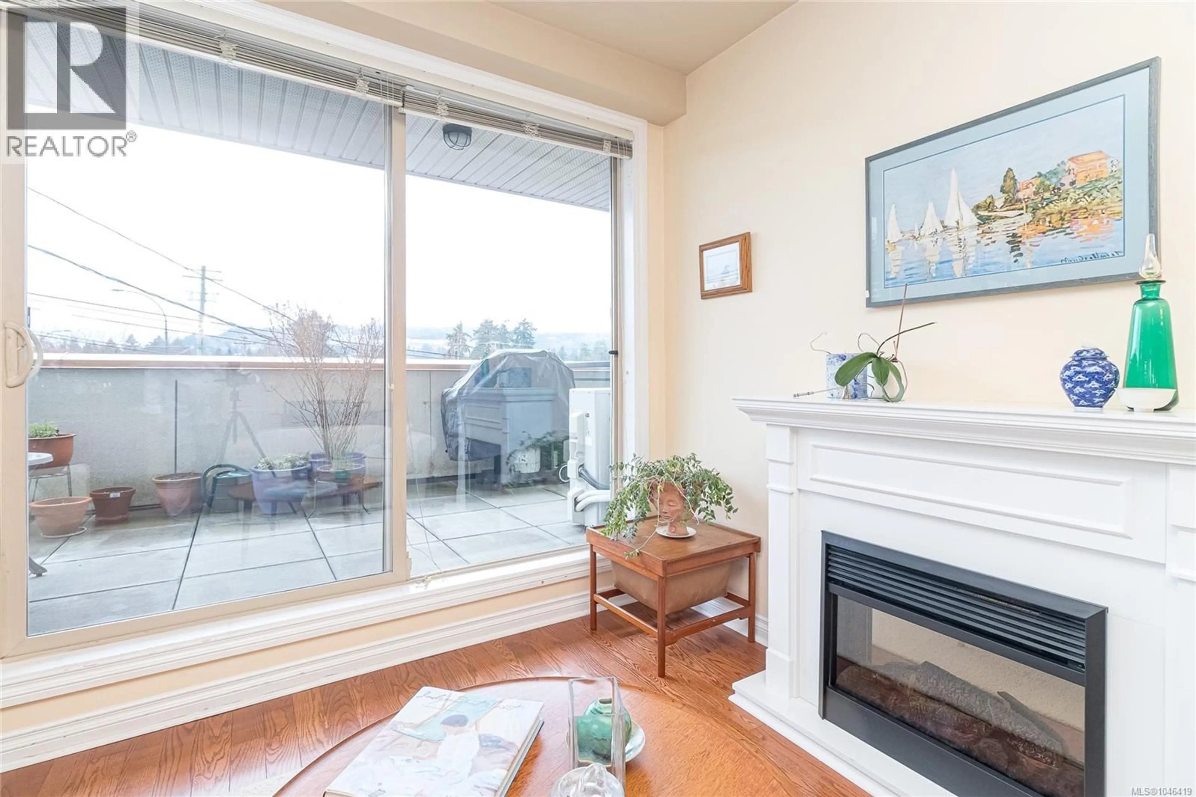 Living room with furniture, wood/laminate floor for 216 - 866 GOLDSTREAM AVENUE, Langford British Columbia V9B0J3