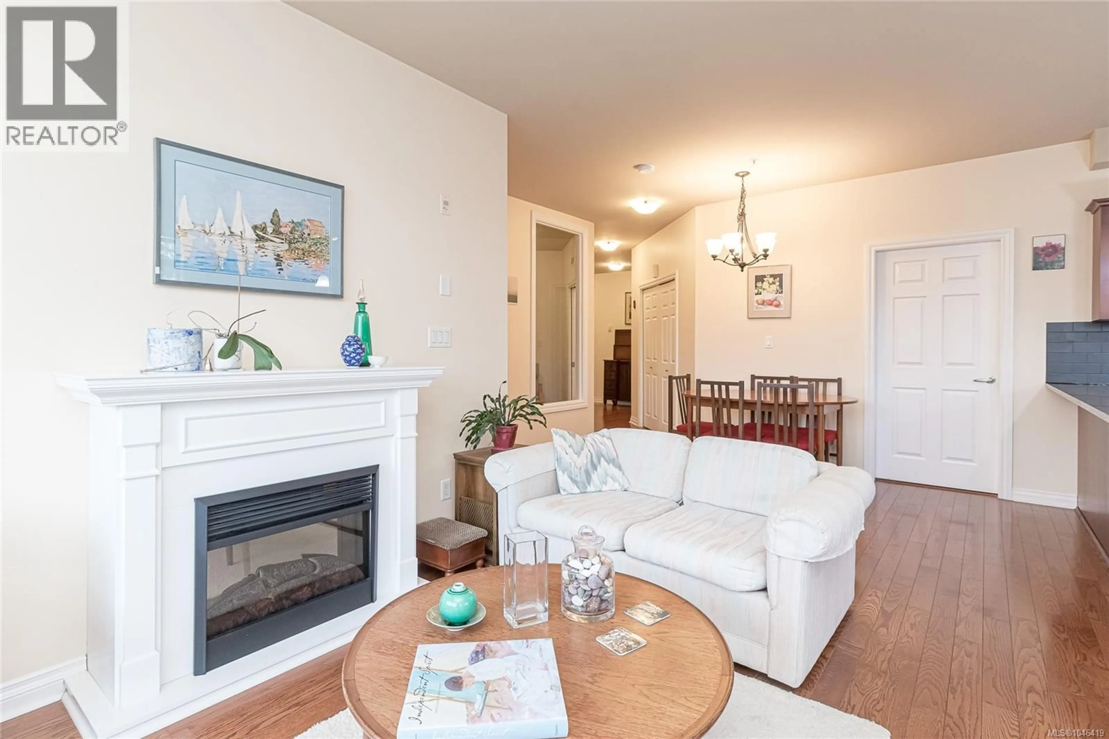 Living room with furniture, wood/laminate floor for 216 - 866 GOLDSTREAM AVENUE, Langford British Columbia V9B0J3
