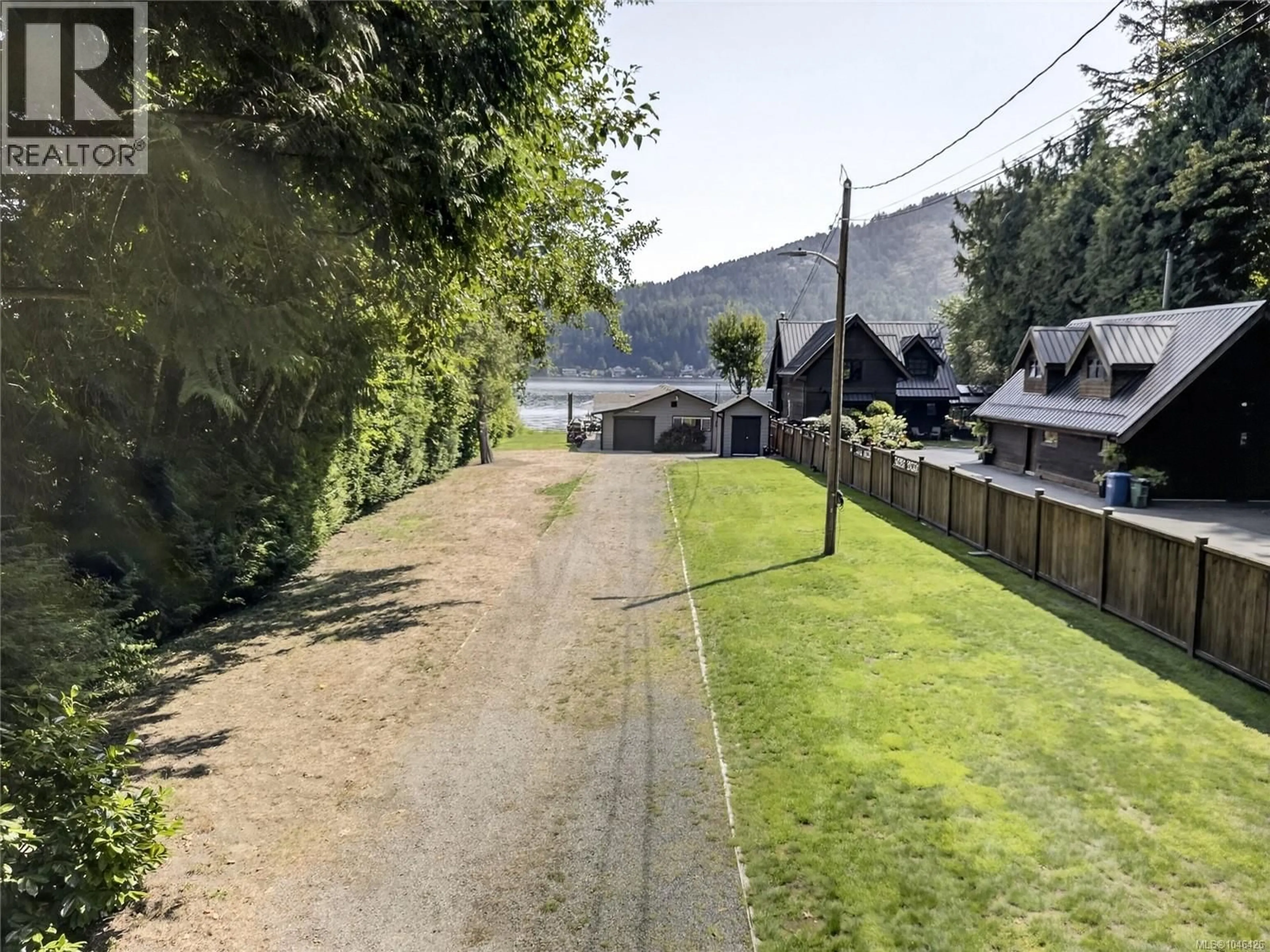 A pic from outside/outdoor area/front of a property/back of a property/a pic from drone, street for 2307 STEVENSON ROAD, Shawnigan Lake British Columbia V0R2W0