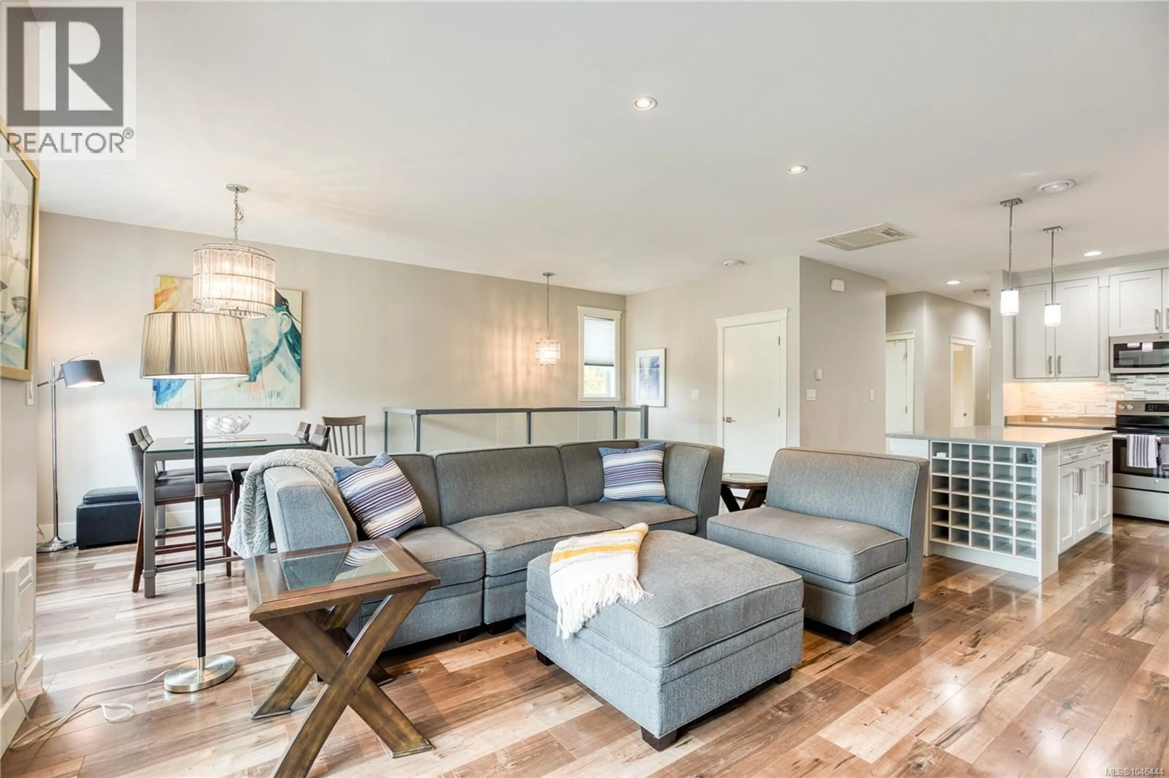 Living room with furniture, wood/laminate floor for 2354 BARCLAY ROAD, Nanaimo British Columbia V9T3J9