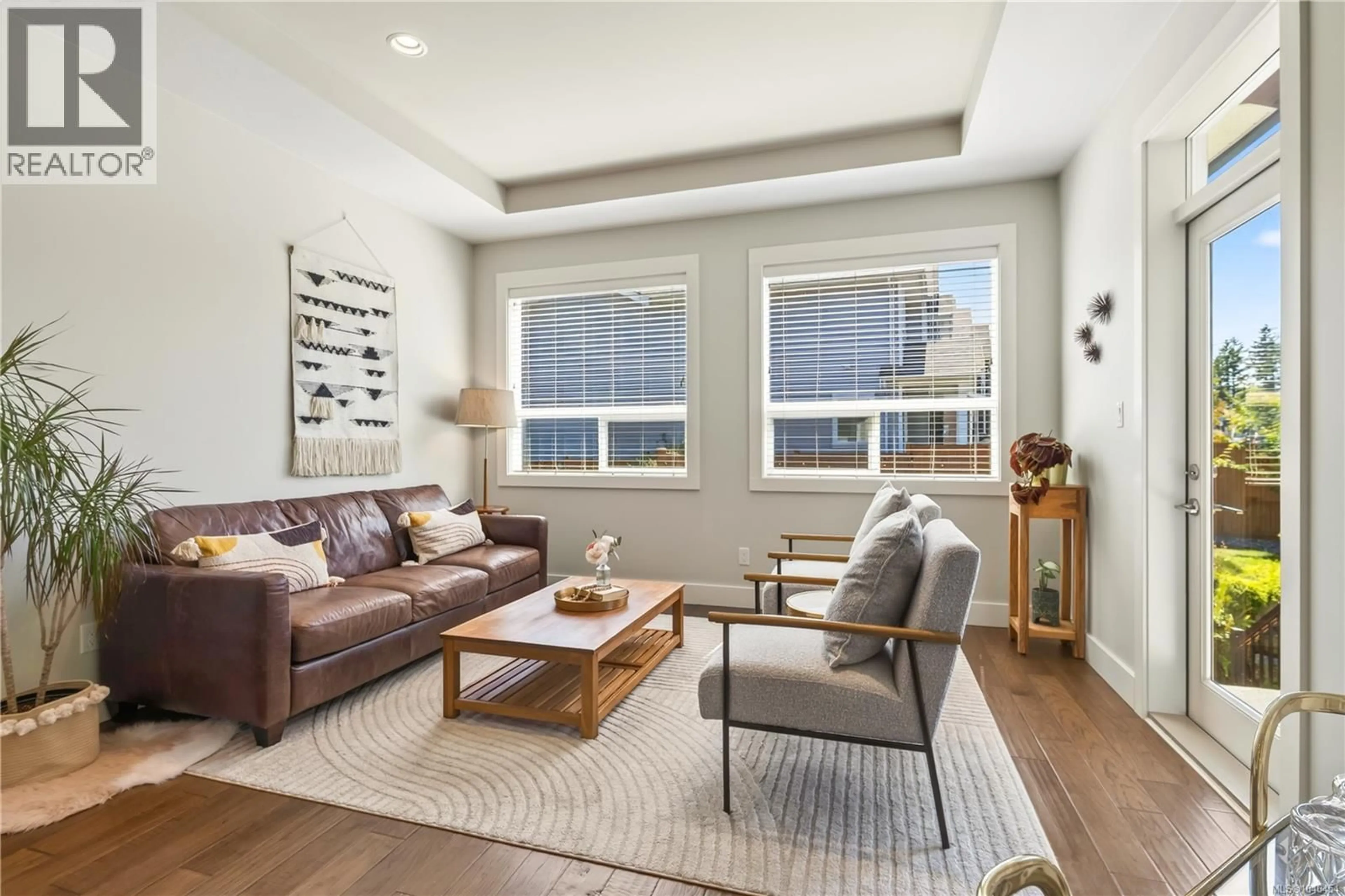 Living room with furniture, wood/laminate floor for 5797 LINYARD ROAD, Nanaimo British Columbia V9T0G6