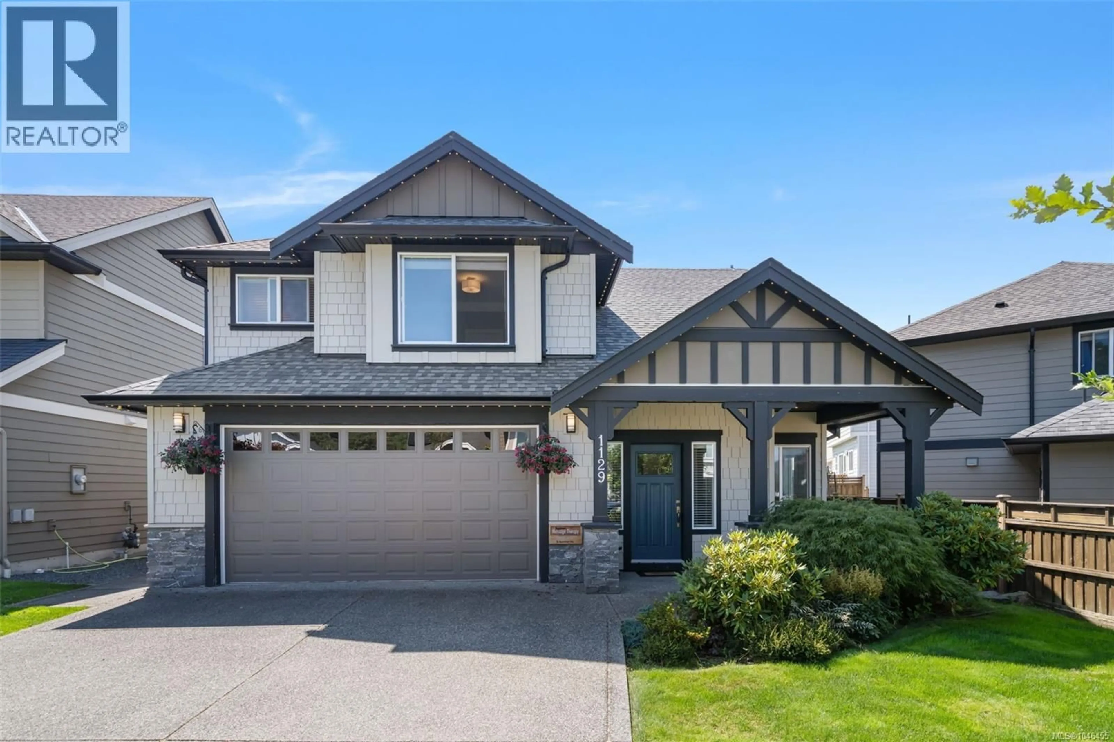 Home with vinyl exterior material, street for 1129 SMOKEHOUSE CRESCENT, Langford British Columbia V9C0J8