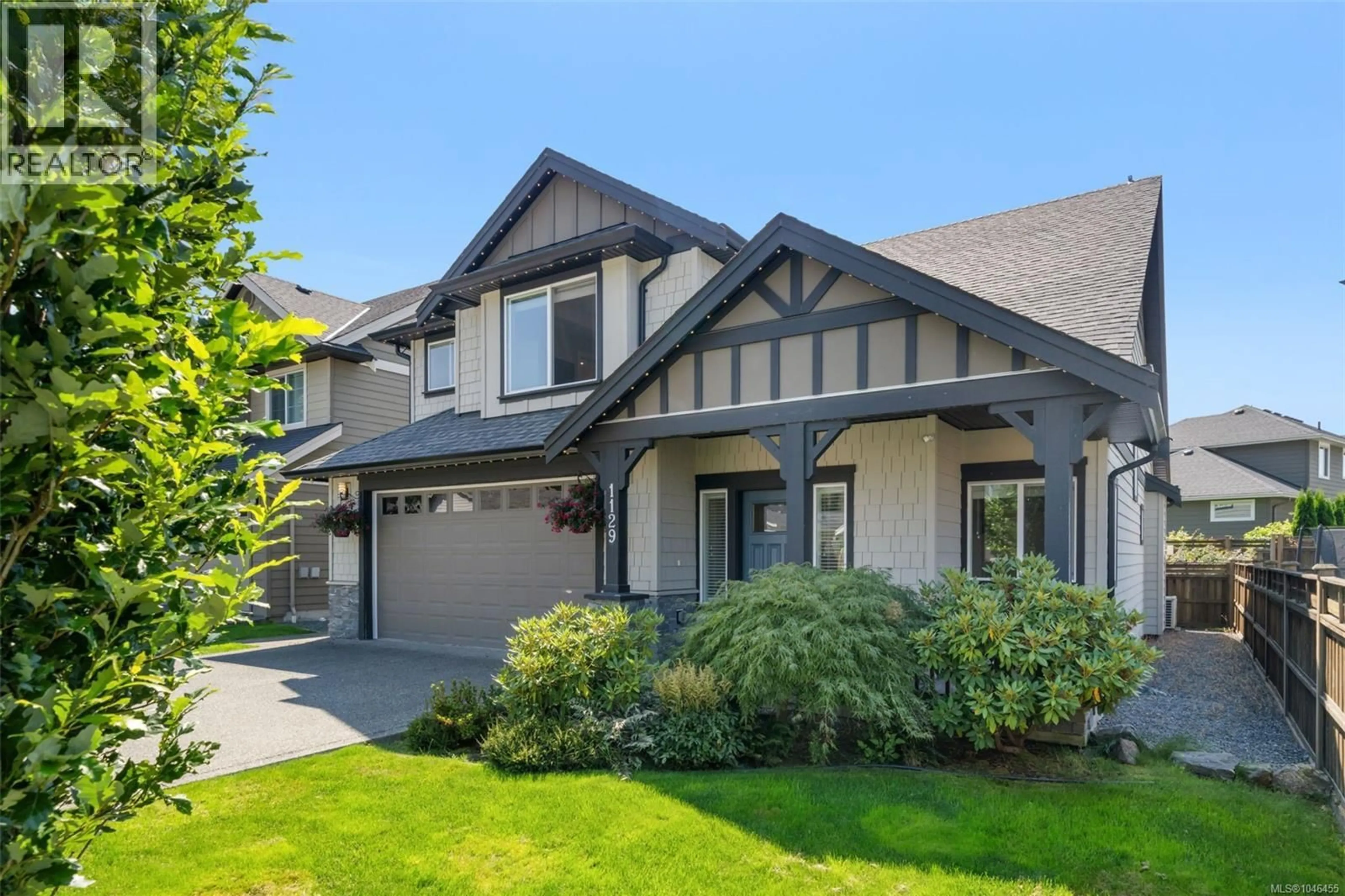 Home with vinyl exterior material, street for 1129 SMOKEHOUSE CRESCENT, Langford British Columbia V9C0J8