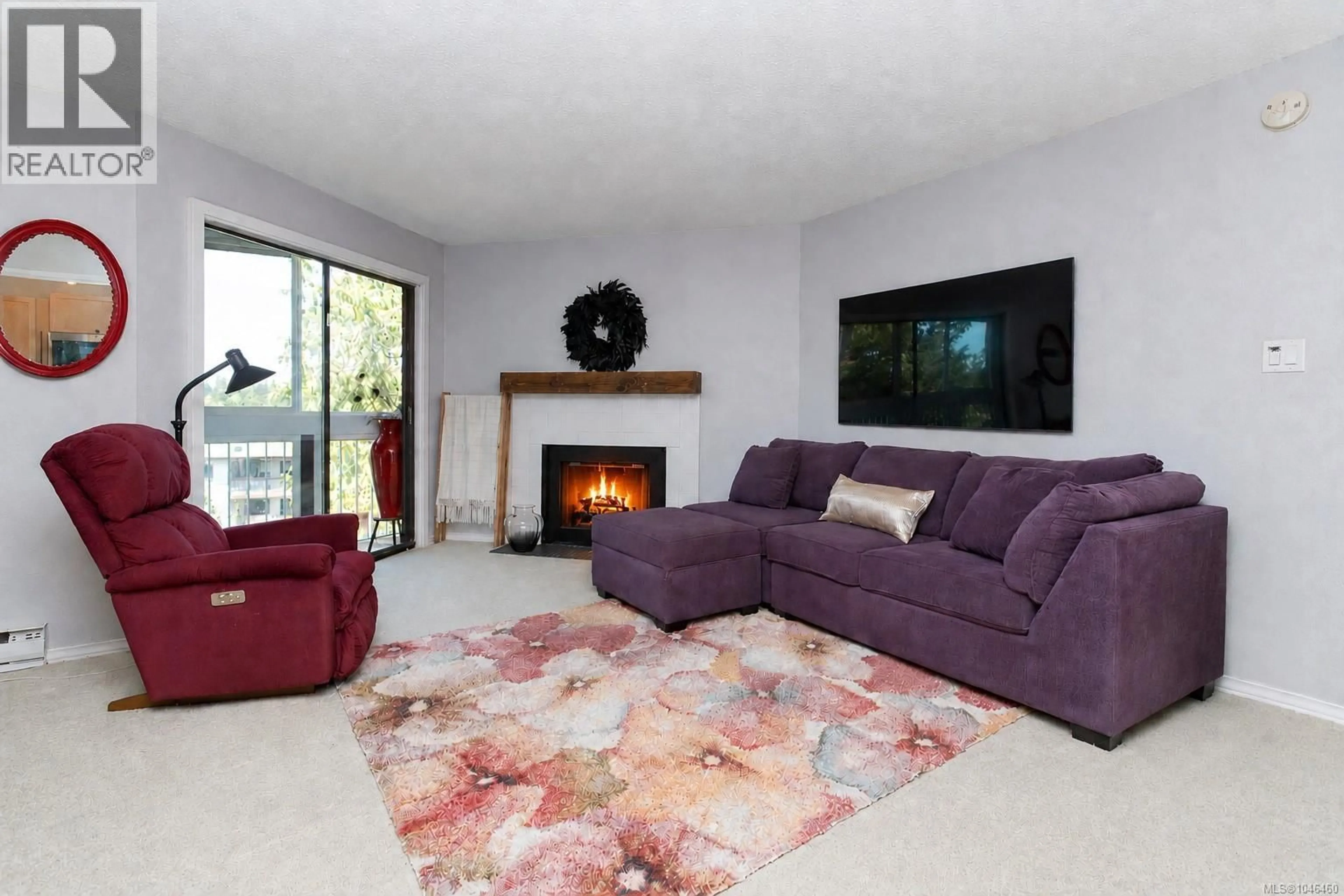 Living room with furniture, carpet floor for 509 - 69 GORGE ROAD WEST, Saanich British Columbia V9A1L9