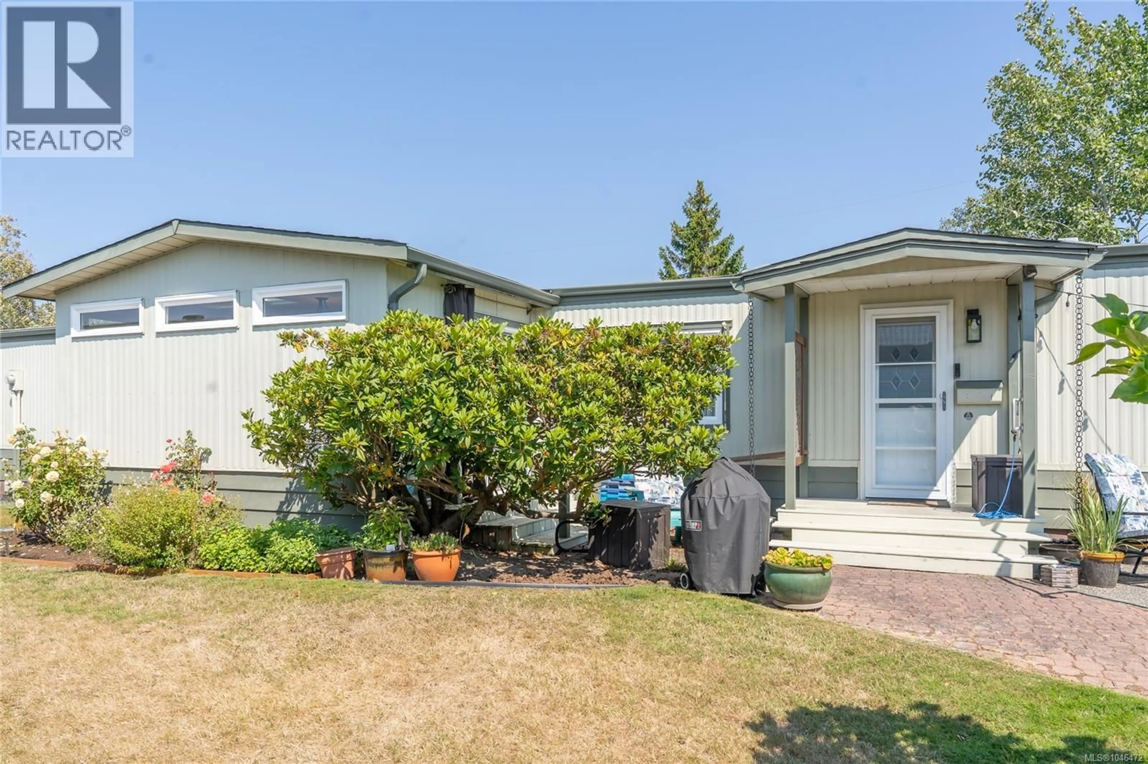 Home with vinyl exterior material, street for 9392 BROOKWOOD DRIVE, Sidney British Columbia V8L4H3