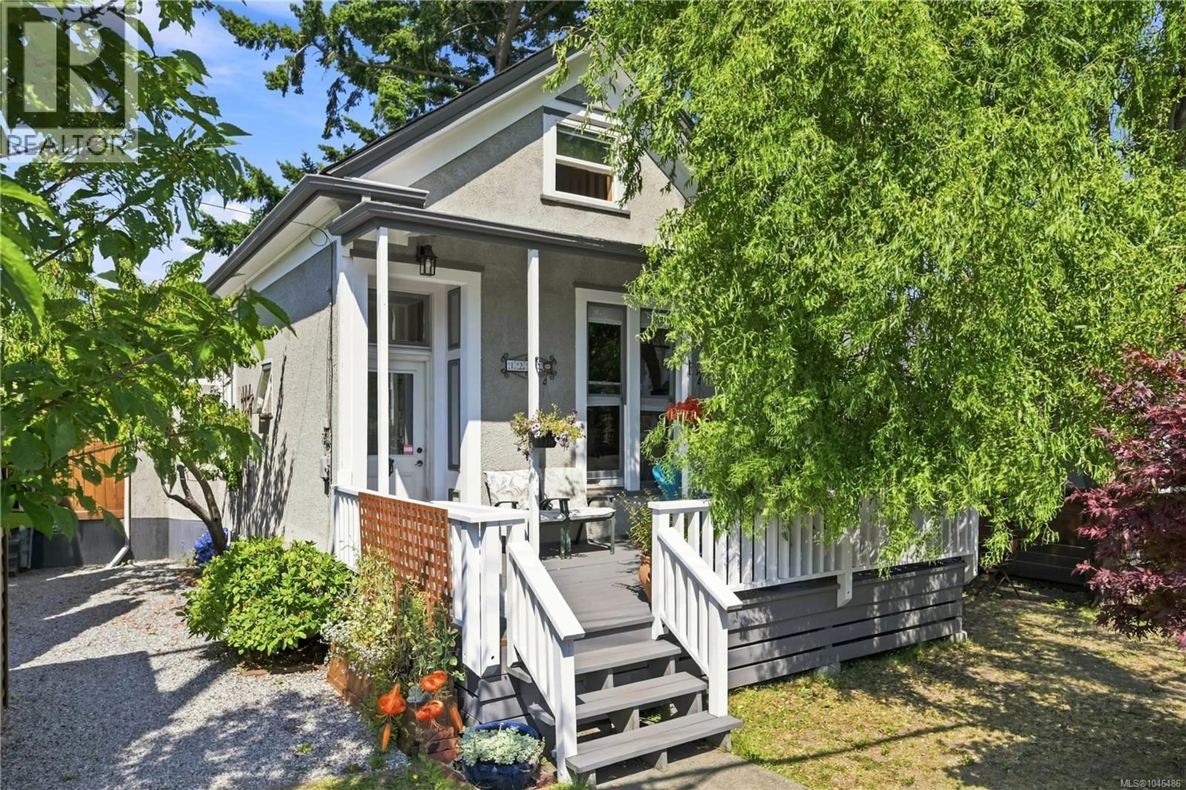 Home with vinyl exterior material, street for 1272 CENTRE ROAD, Victoria British Columbia V8T1K3