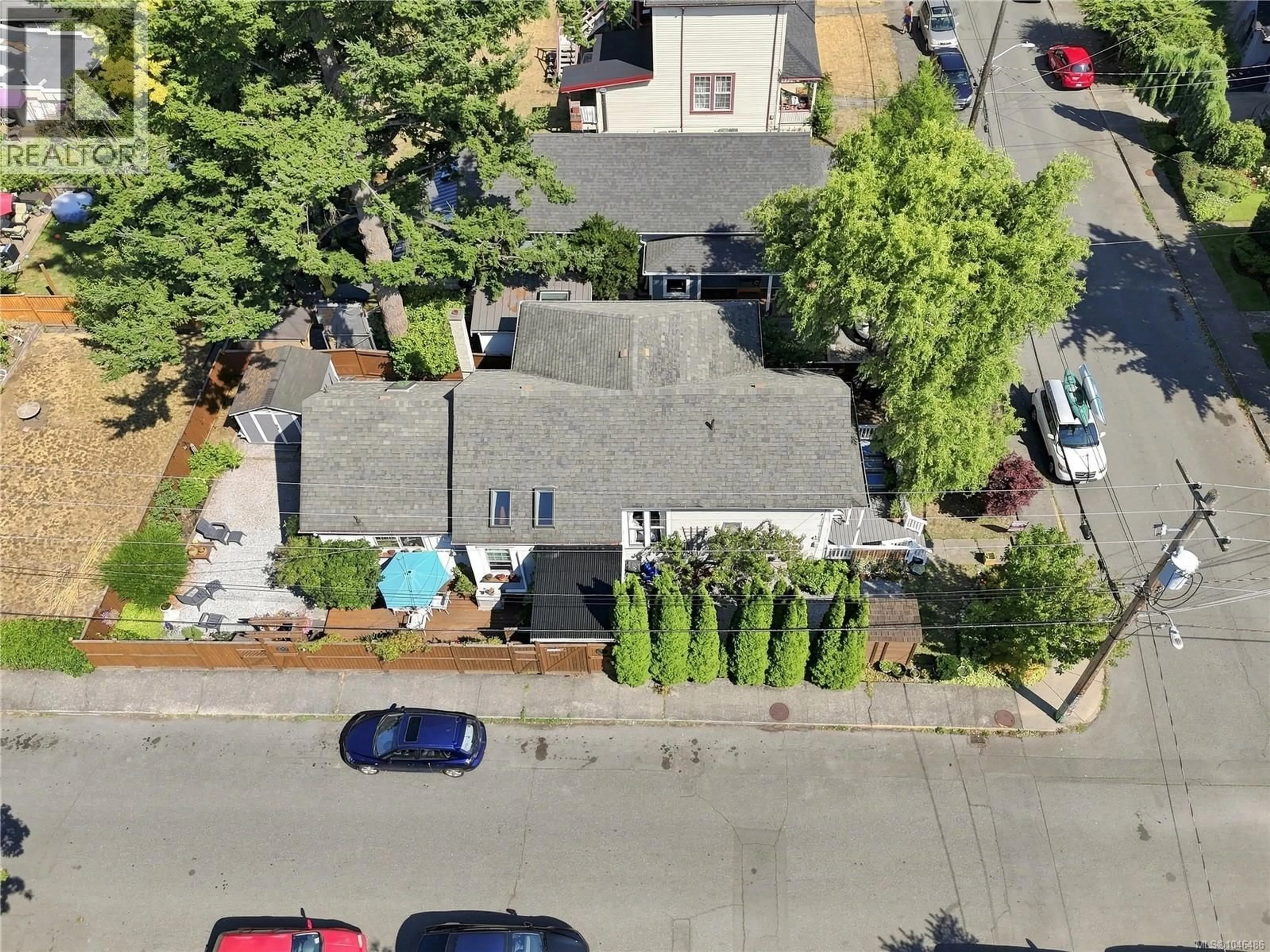 A pic from outside/outdoor area/front of a property/back of a property/a pic from drone, street for 1272 CENTRE ROAD, Victoria British Columbia V8T1K3