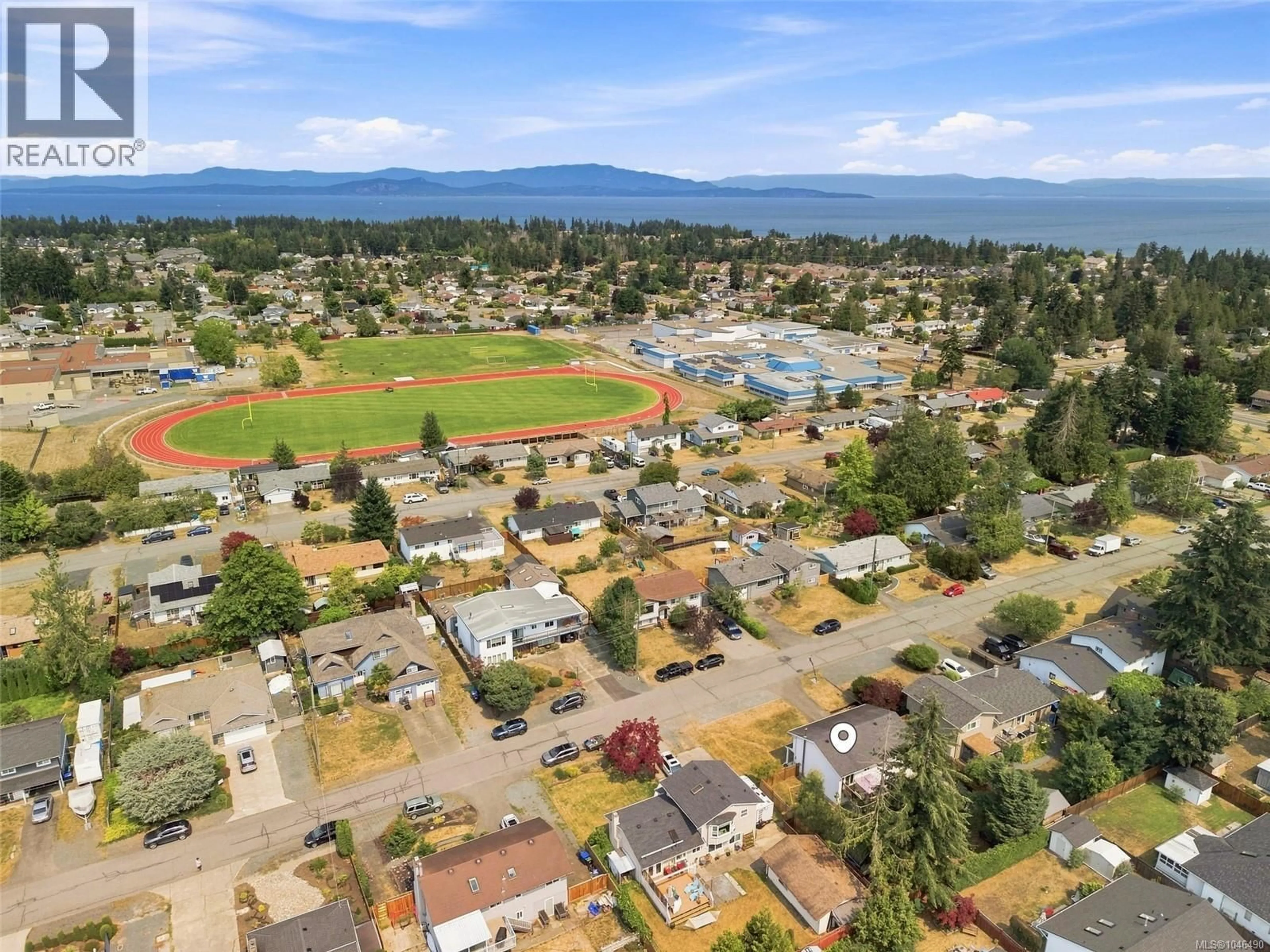 A pic from outside/outdoor area/front of a property/back of a property/a pic from drone, mountain view for 744 NEWCASTLE AVENUE, Parksville British Columbia V9P1G1