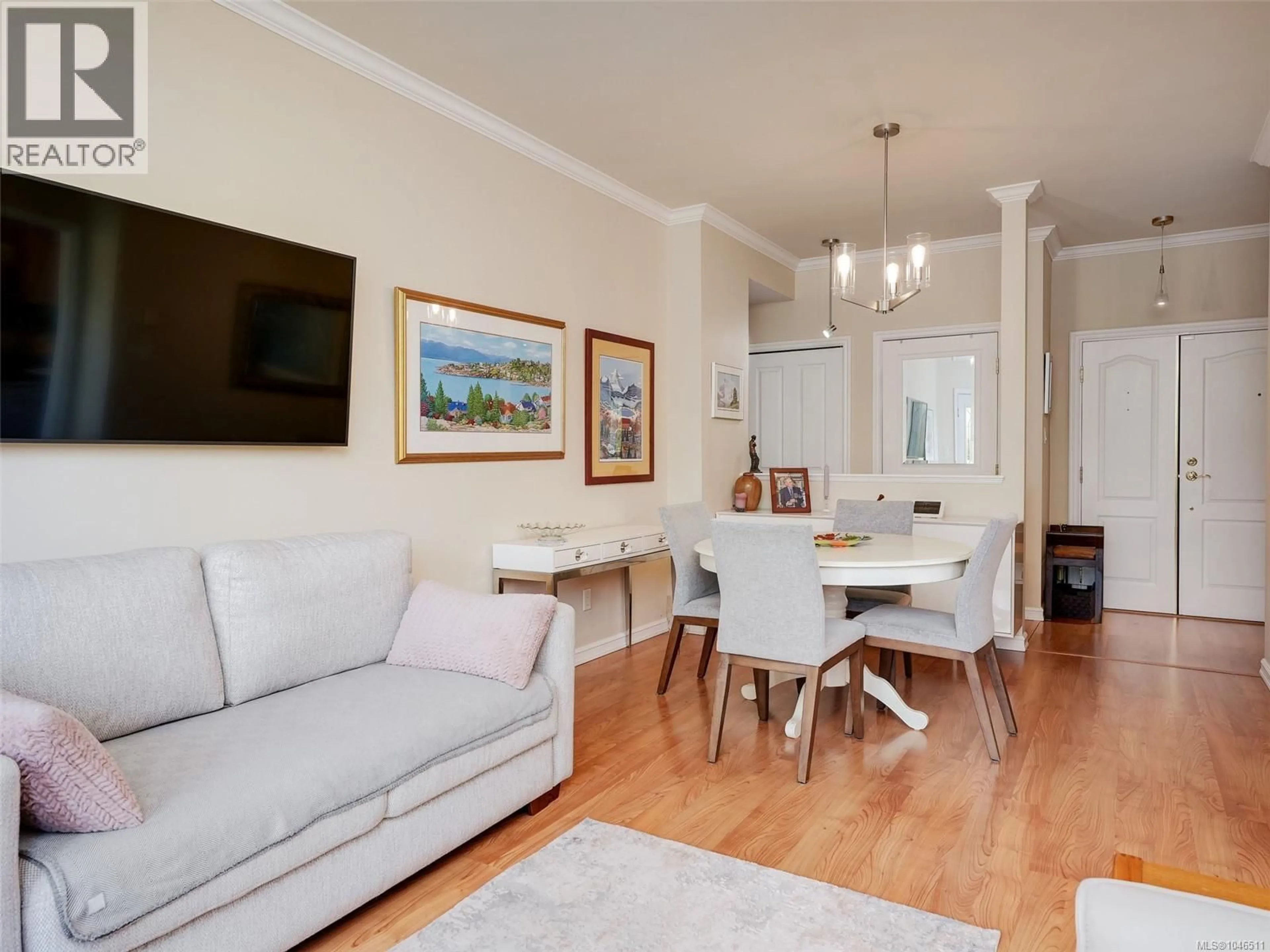 Living room with furniture, wood/laminate floor for 303 - 165 KIMTA ROAD, Victoria British Columbia V9A7P1