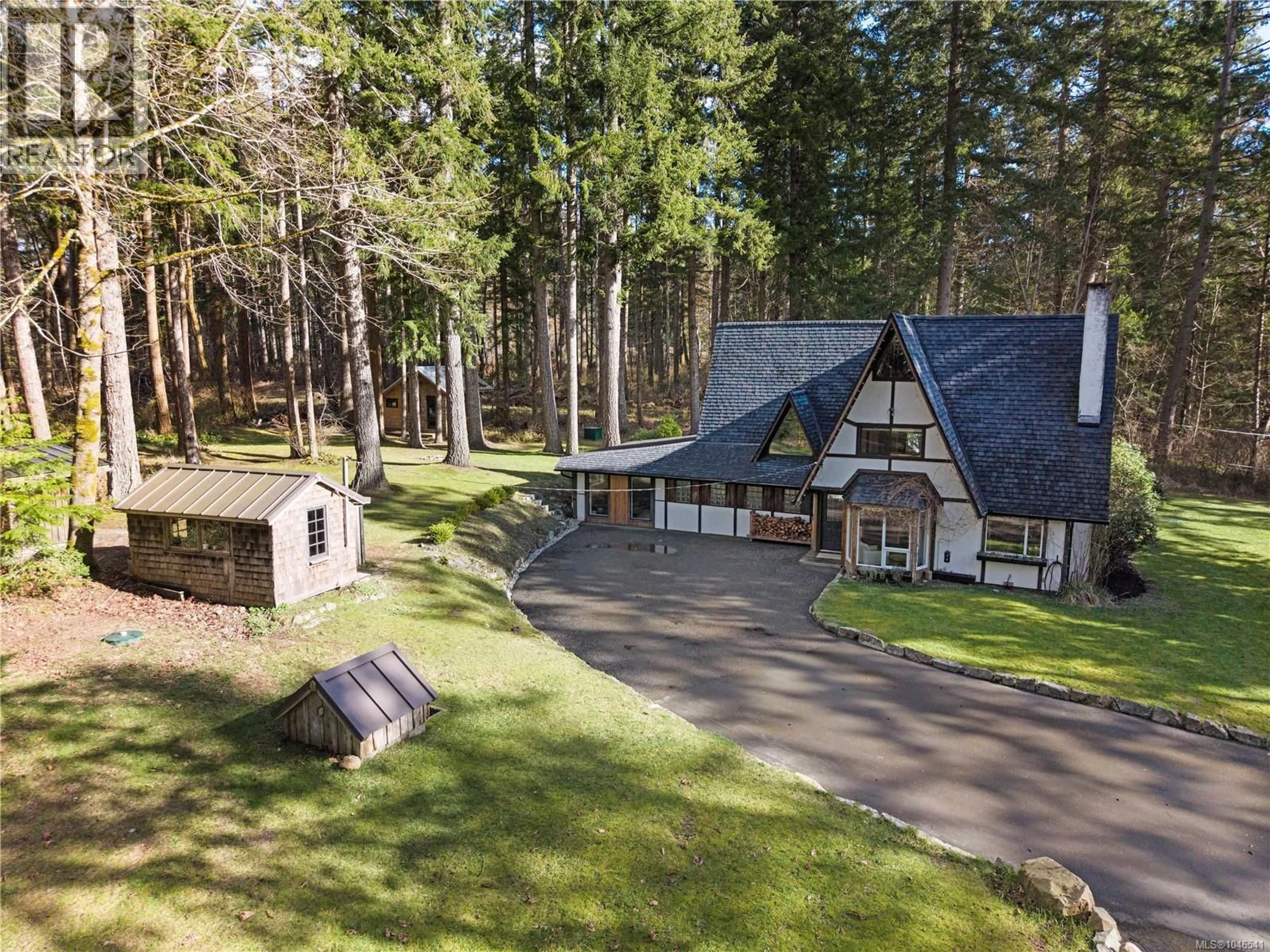A pic from outside/outdoor area/front of a property/back of a property/a pic from drone, forest/trees view for 2138 LEFT ROAD, Courtenay British Columbia V9J1T9