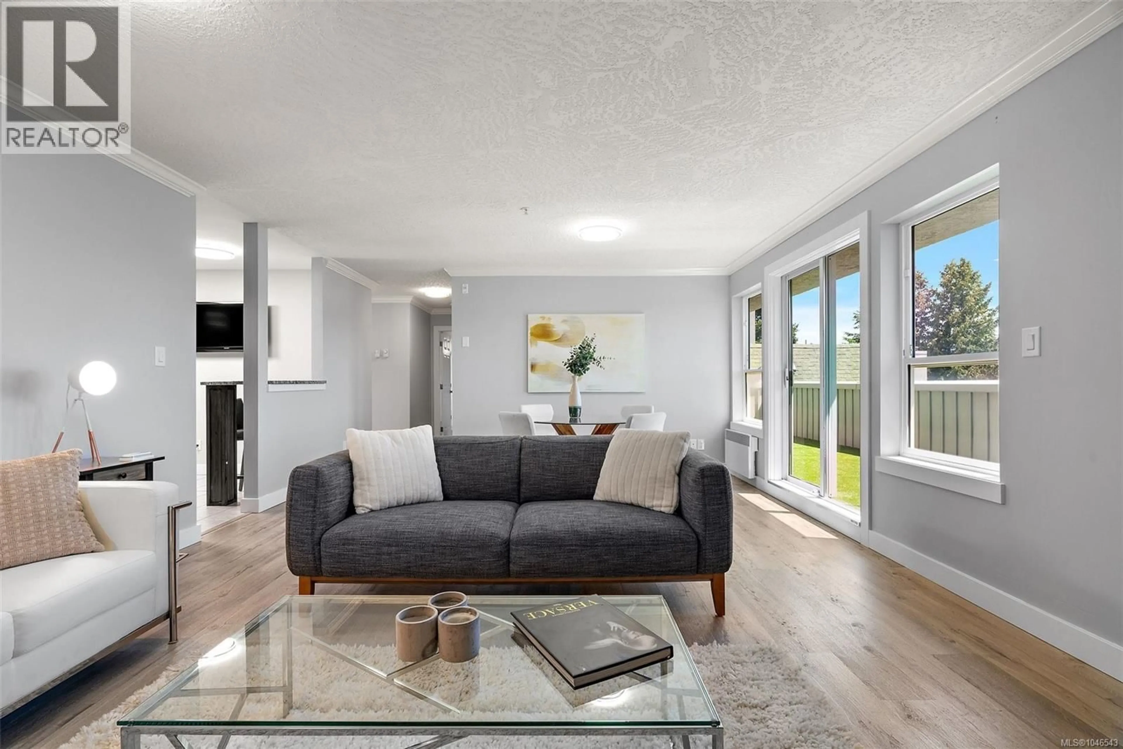 Living room with furniture, unknown for 302 - 7143 WEST SAANICH ROAD, Central Saanich British Columbia V8M1P7
