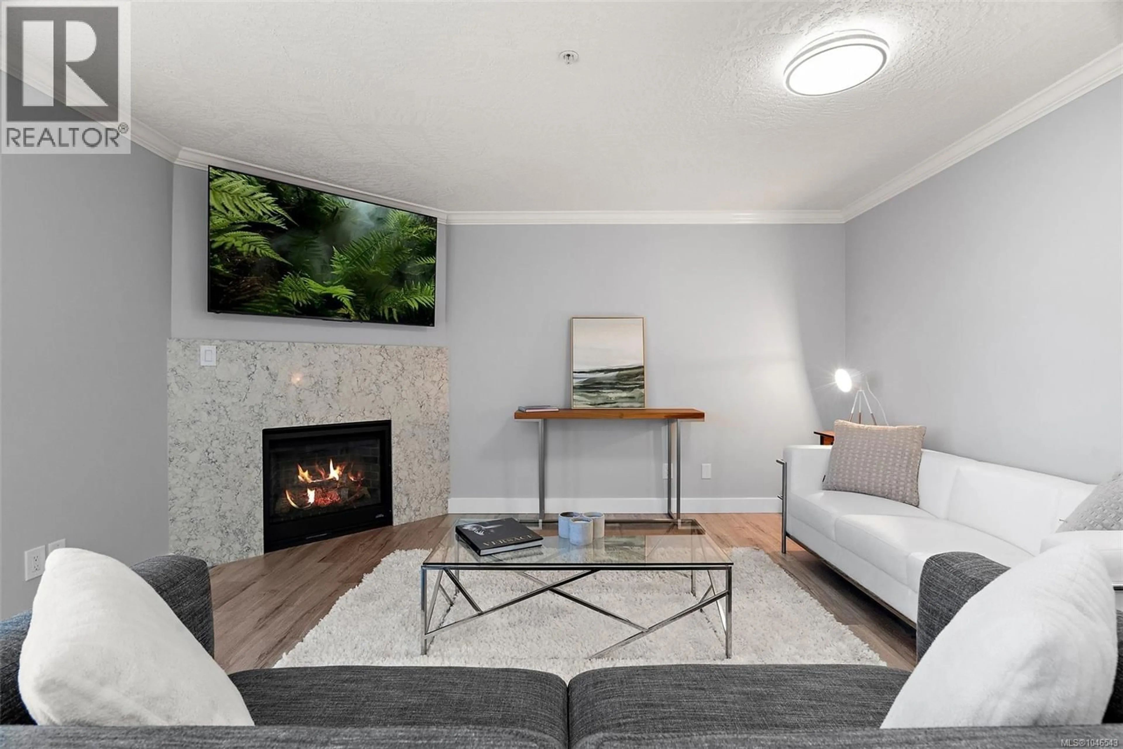 Living room with furniture, unknown for 302 - 7143 WEST SAANICH ROAD, Central Saanich British Columbia V8M1P7