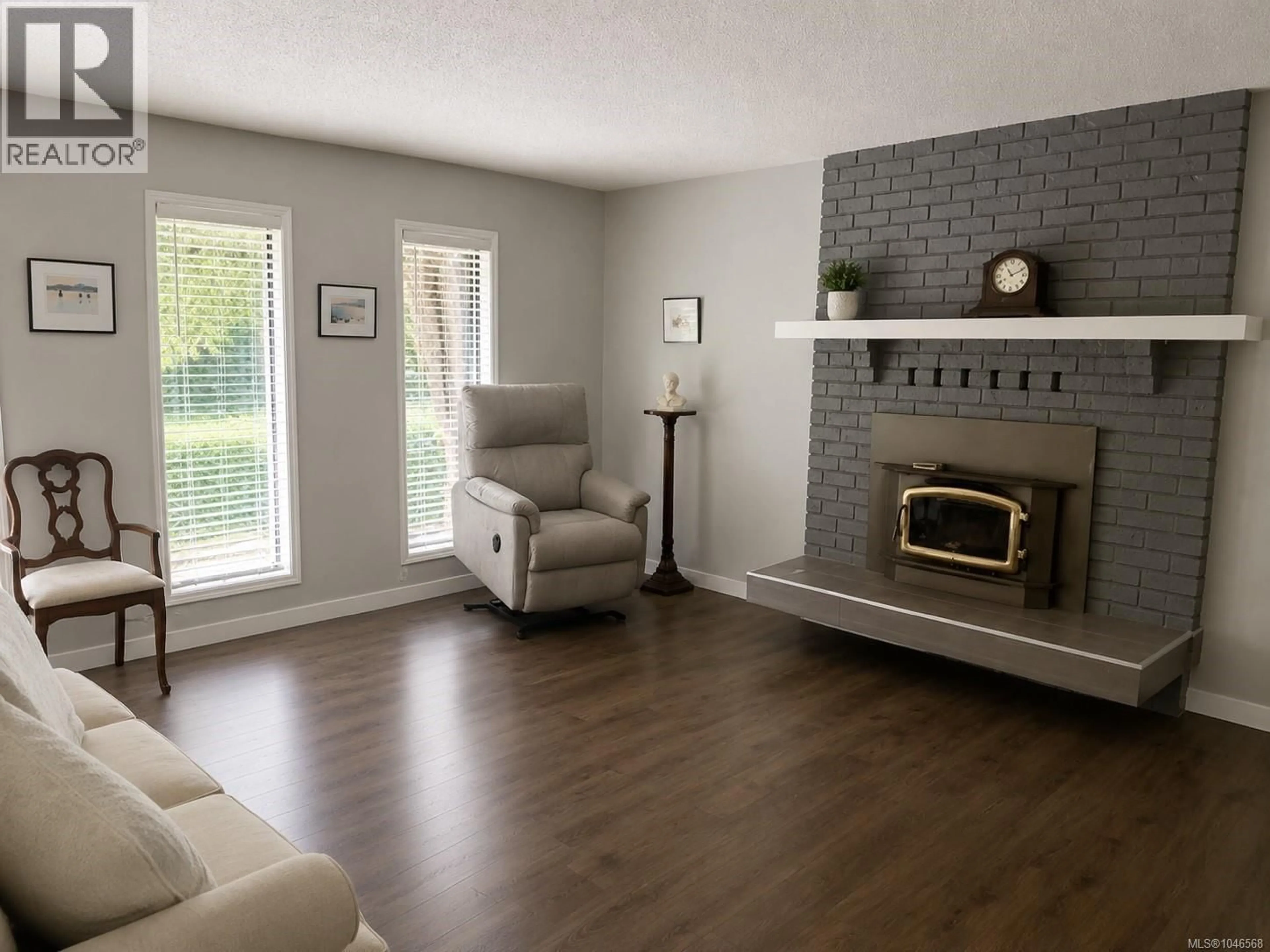 Living room with furniture, unknown for 783 CANYON CRESCENT DRIVE, Qualicum Beach British Columbia V9K1K9