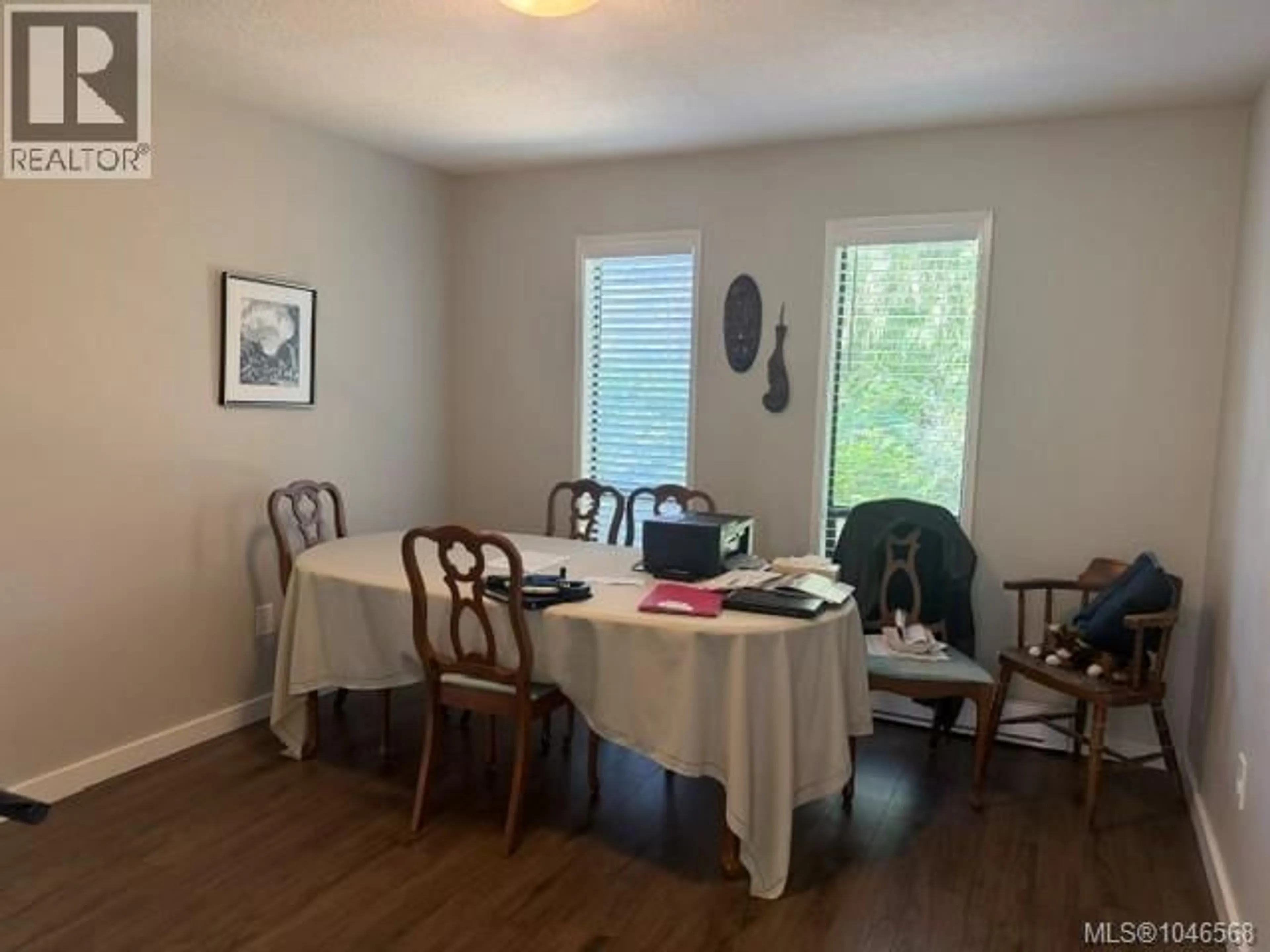 Dining room, wood/laminate floor for 783 CANYON CRESCENT DRIVE, Qualicum Beach British Columbia V9K1K9