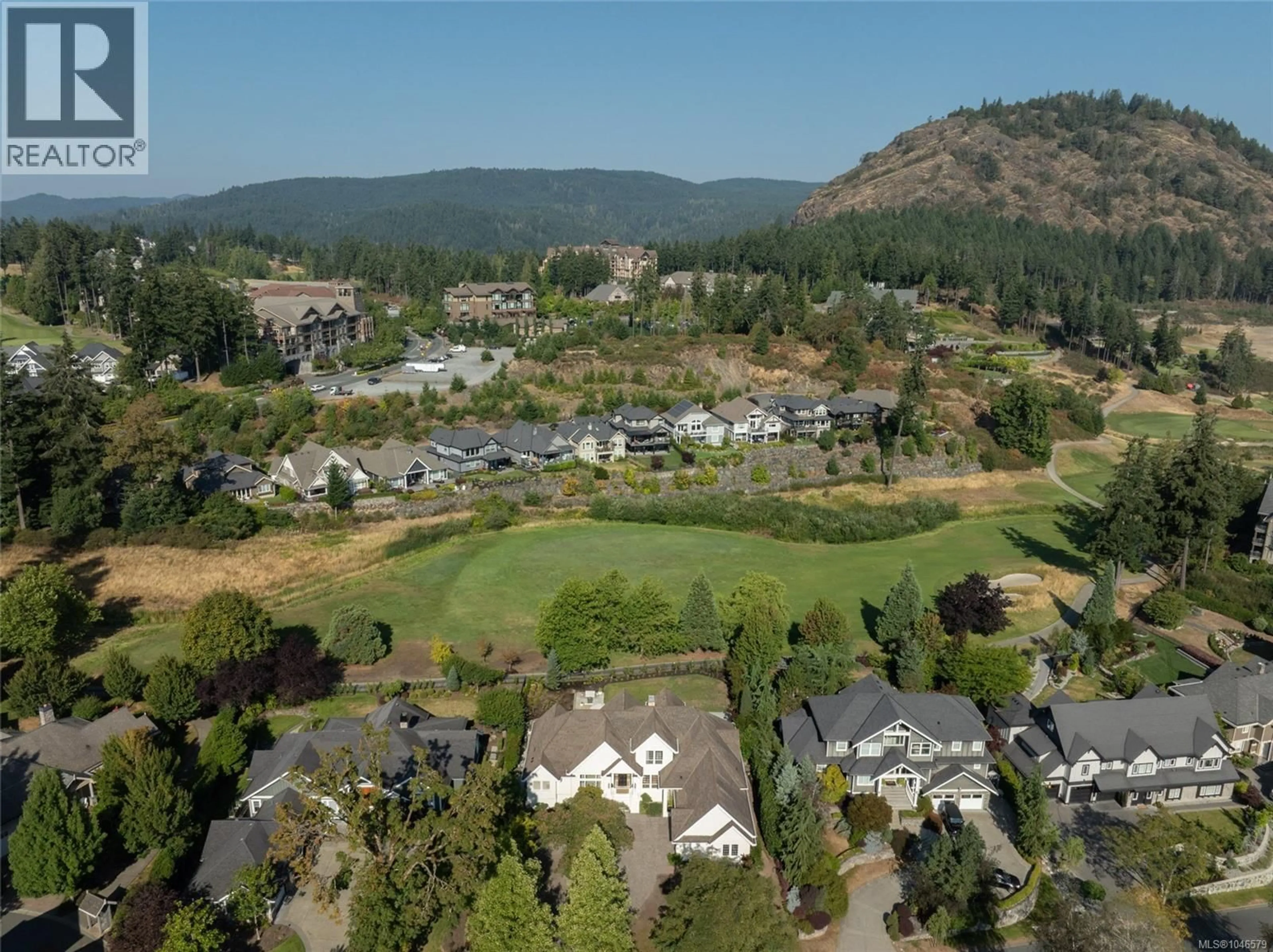 A pic from outside/outdoor area/front of a property/back of a property/a pic from drone, mountain view for 2050 TROON COURT, Langford British Columbia V9B6R6