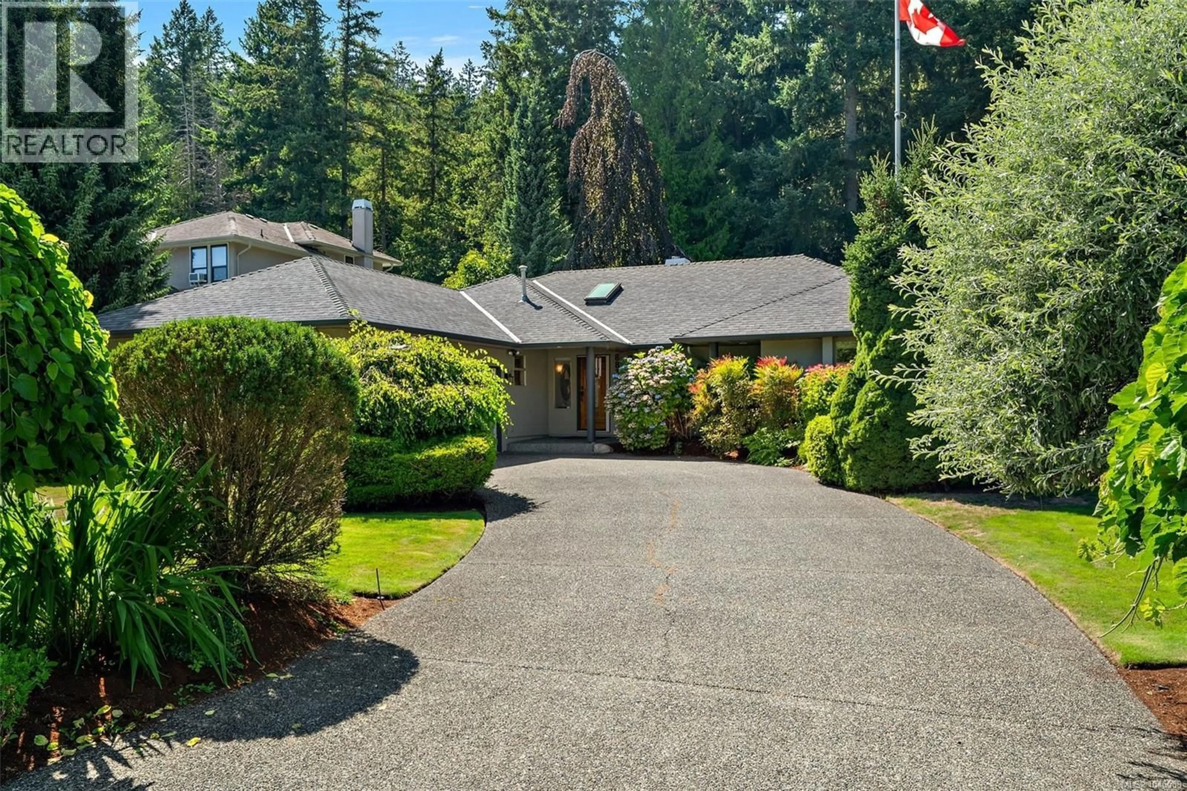 A pic from outside/outdoor area/front of a property/back of a property/a pic from drone, street for 8832 CARMANAH TERRACE, North Saanich British Columbia V8L5E9