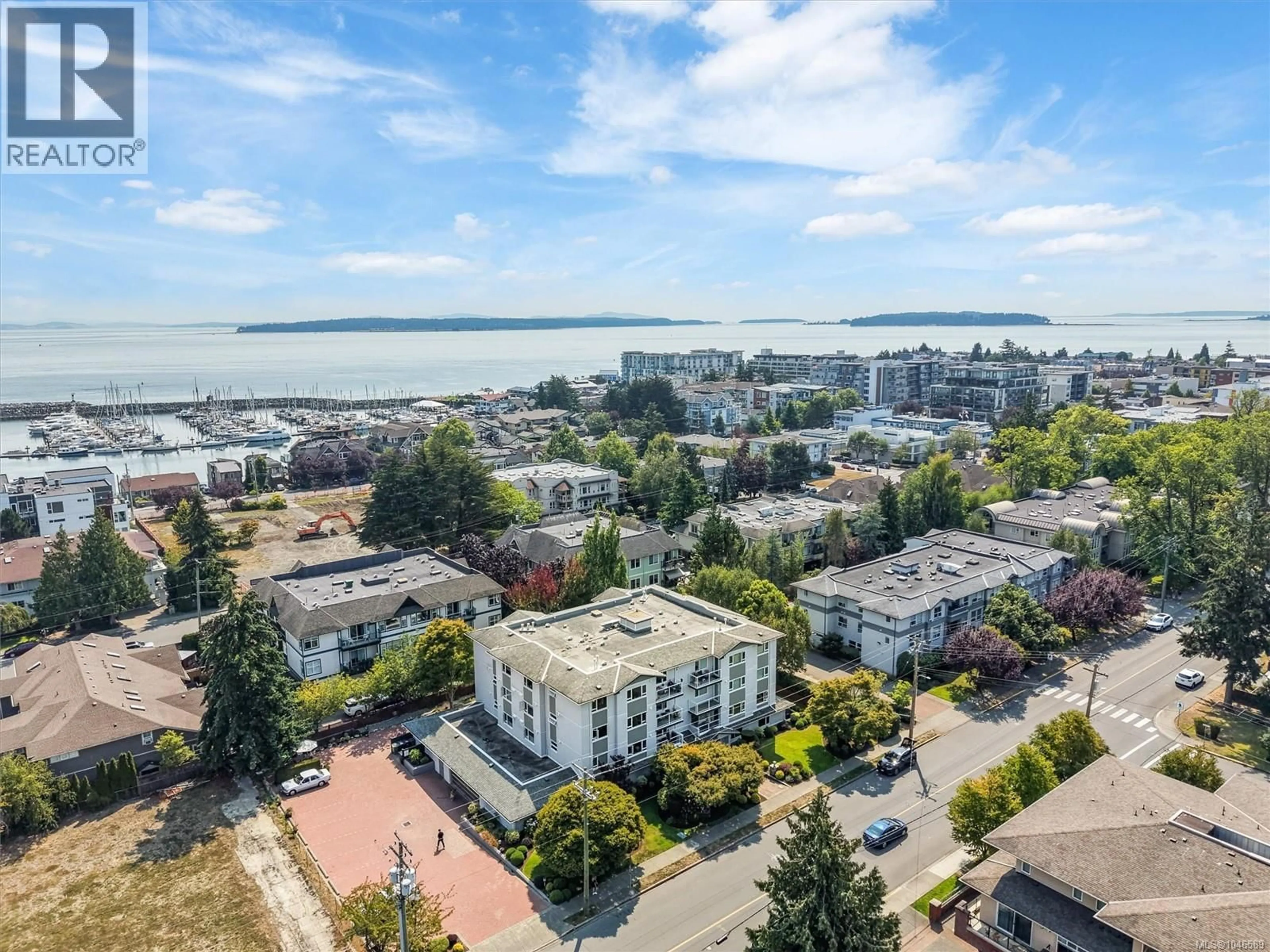 A pic from outside/outdoor area/front of a property/back of a property/a pic from drone, city buildings view from balcony for 302 - 9975 FIFTH STREET, Sidney British Columbia V8L2X6