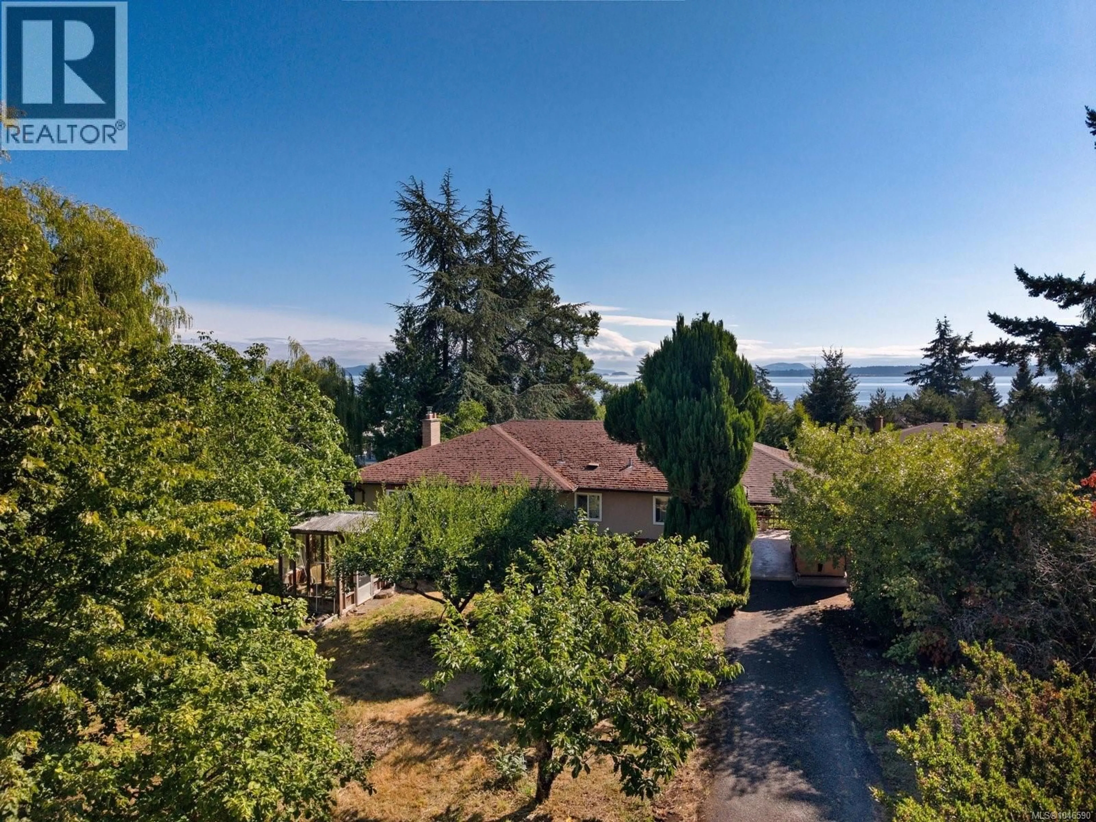 A pic from outside/outdoor area/front of a property/back of a property/a pic from drone, water/lake/river/ocean view for 8625 ALDOUS TERRACE, North Saanich British Columbia V8L1L3