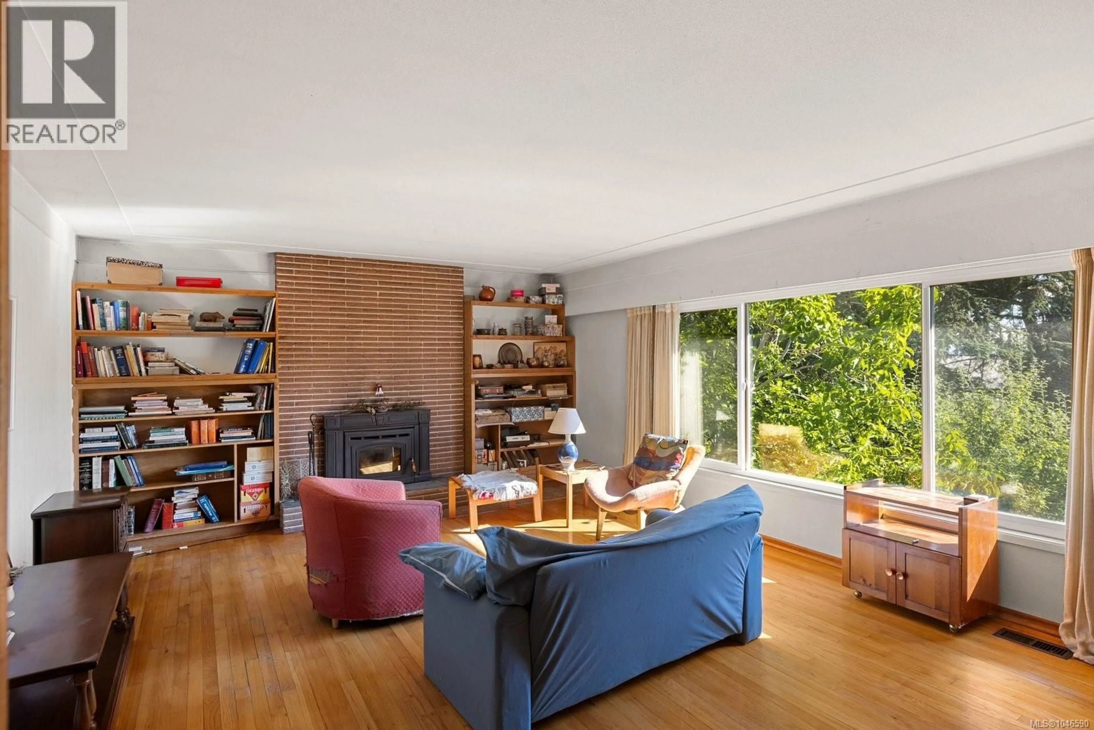 Living room with furniture, unknown for 8625 ALDOUS TERRACE, North Saanich British Columbia V8L1L3