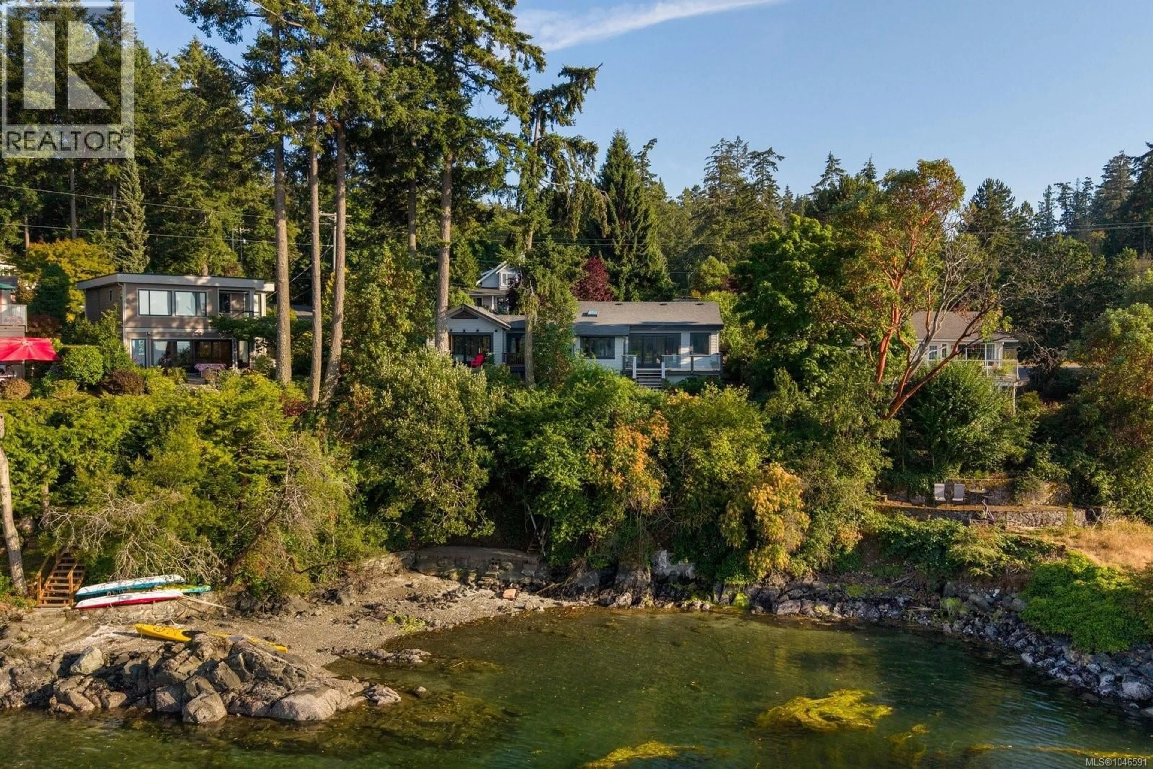 A pic from outside/outdoor area/front of a property/back of a property/a pic from drone, water/lake/river/ocean view for 10994 MADRONA DRIVE, North Saanich British Columbia V8L5R7